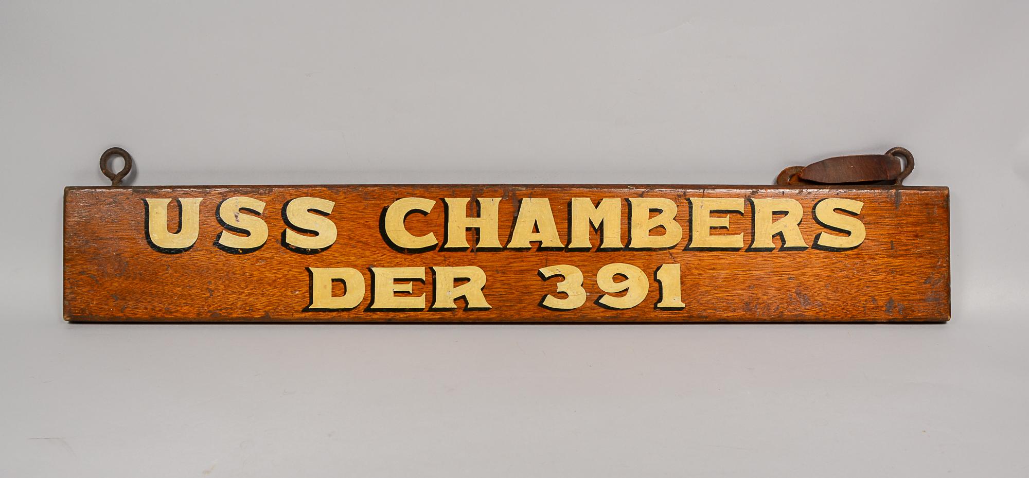 Ship name board for the USS Chambers DER 391. The Chambers was a Edsall-class destroyer escort. The ship was in service with the United States Navy from 1943 to 1946 and from 1955 to 1960. From 1952 to 1954, she was loaned to the United States Coast