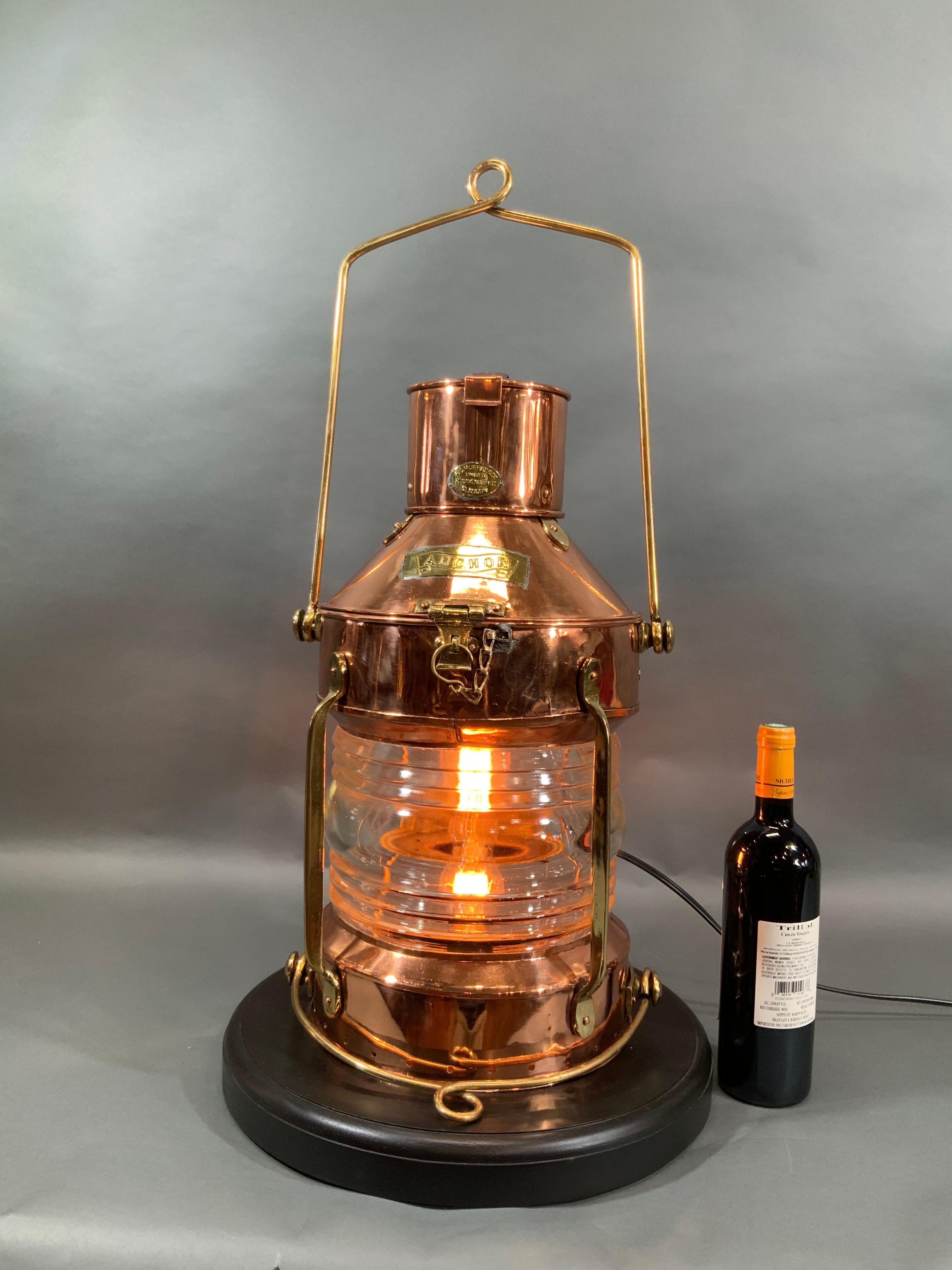 British Ship's Anchor Lantern of Copper and Brass with Fresnel Glass Lens by R.C. Murray For Sale