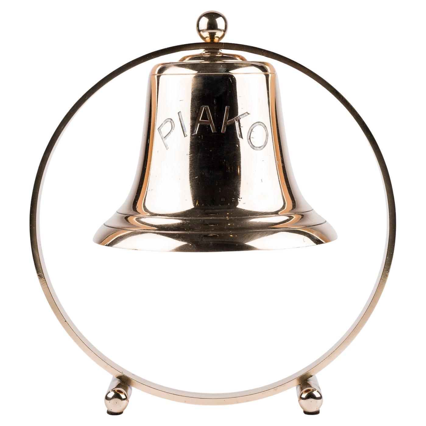 Ship's bell on a Art Deco bronze circular mount, for the steam ship PIAKO