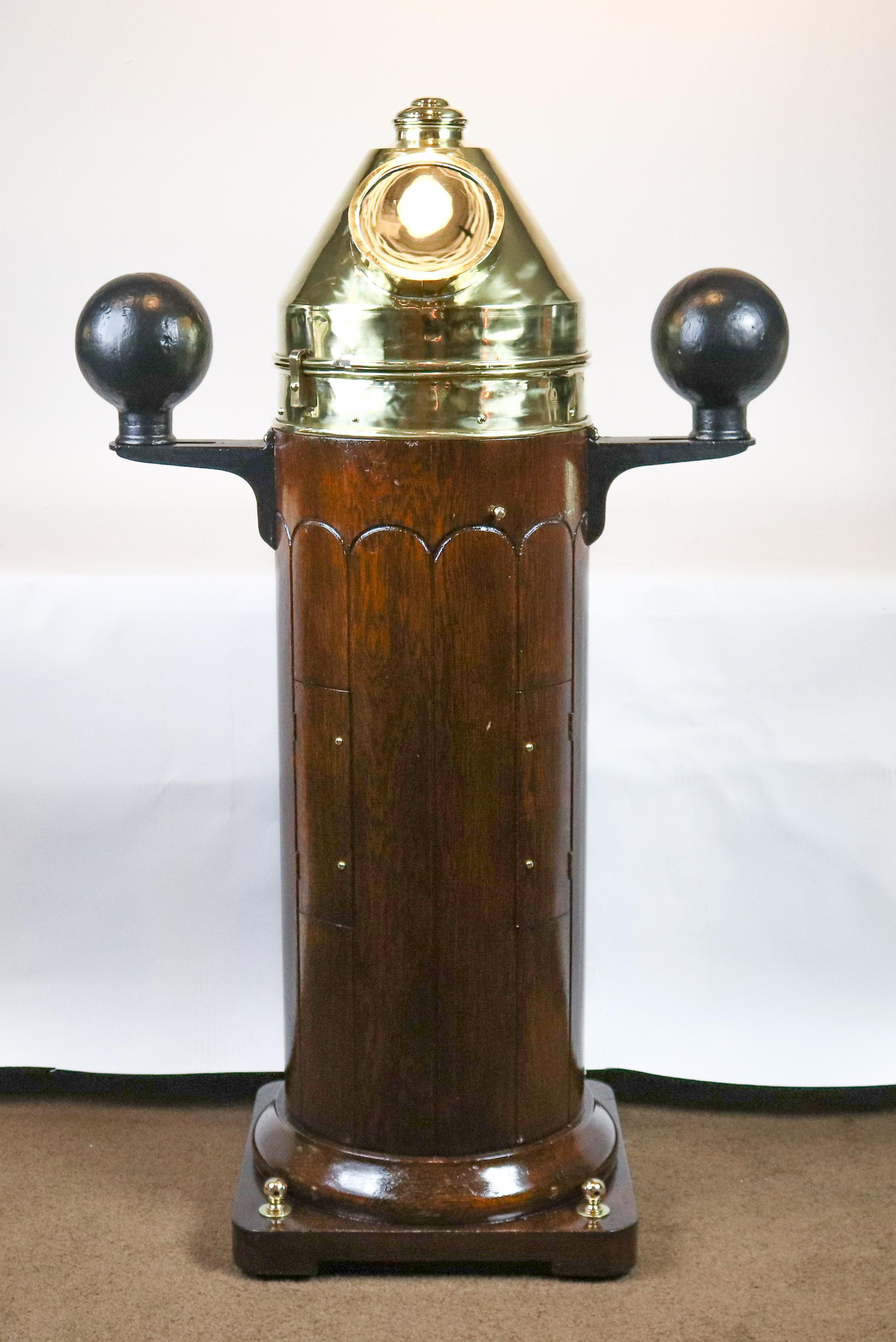 Classic American ship's binnacle wonderfully restored with gimbaled compass by Wilfrid White of Boston. Varnished base with compensating balls. Measures: 52 x 33 x 17.