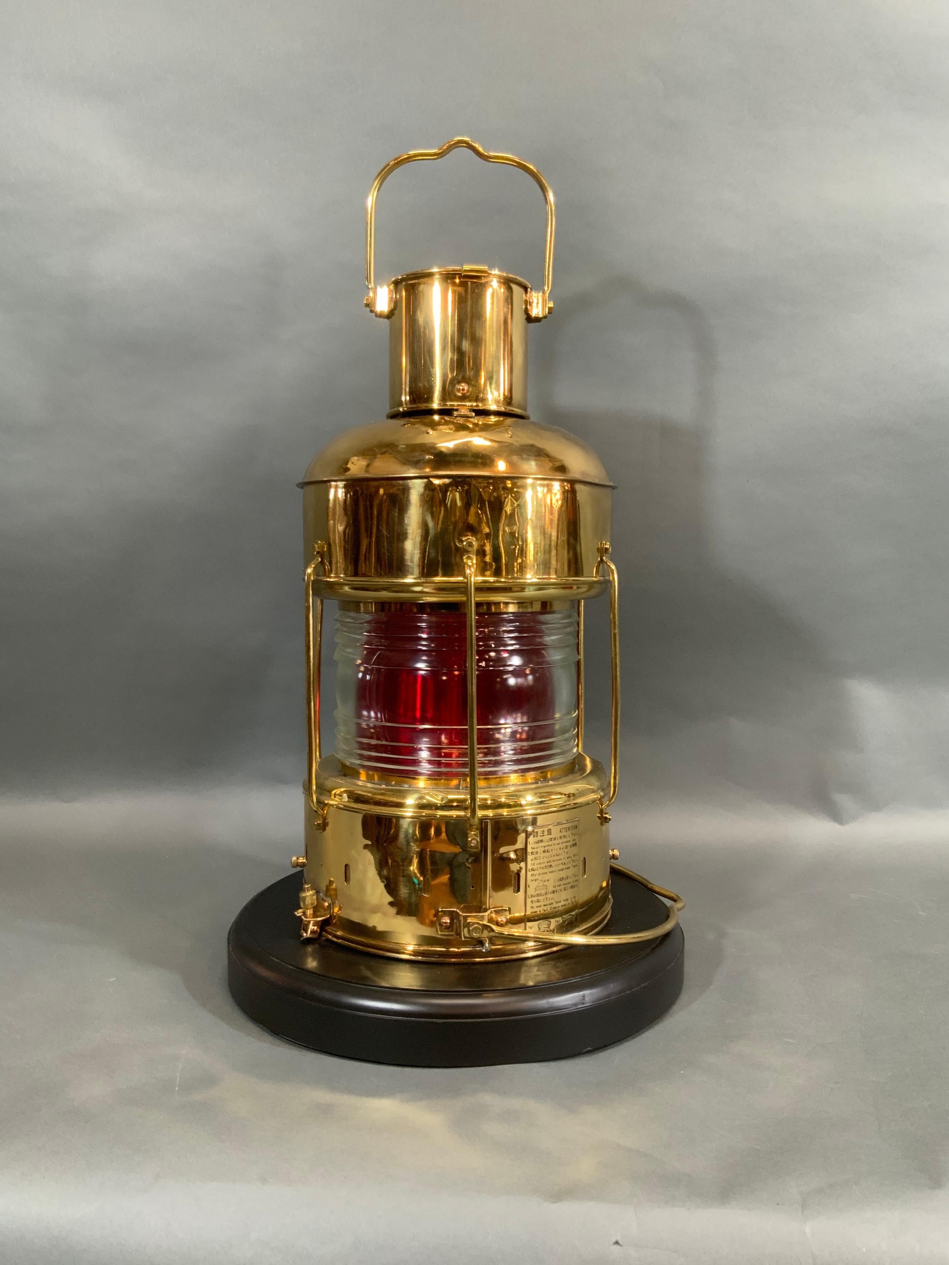 Ship's Lantern of Solid Polished Brass with Fresnel Lens by Nippon Sento Co. LTD In Good Condition For Sale In Norwell, MA