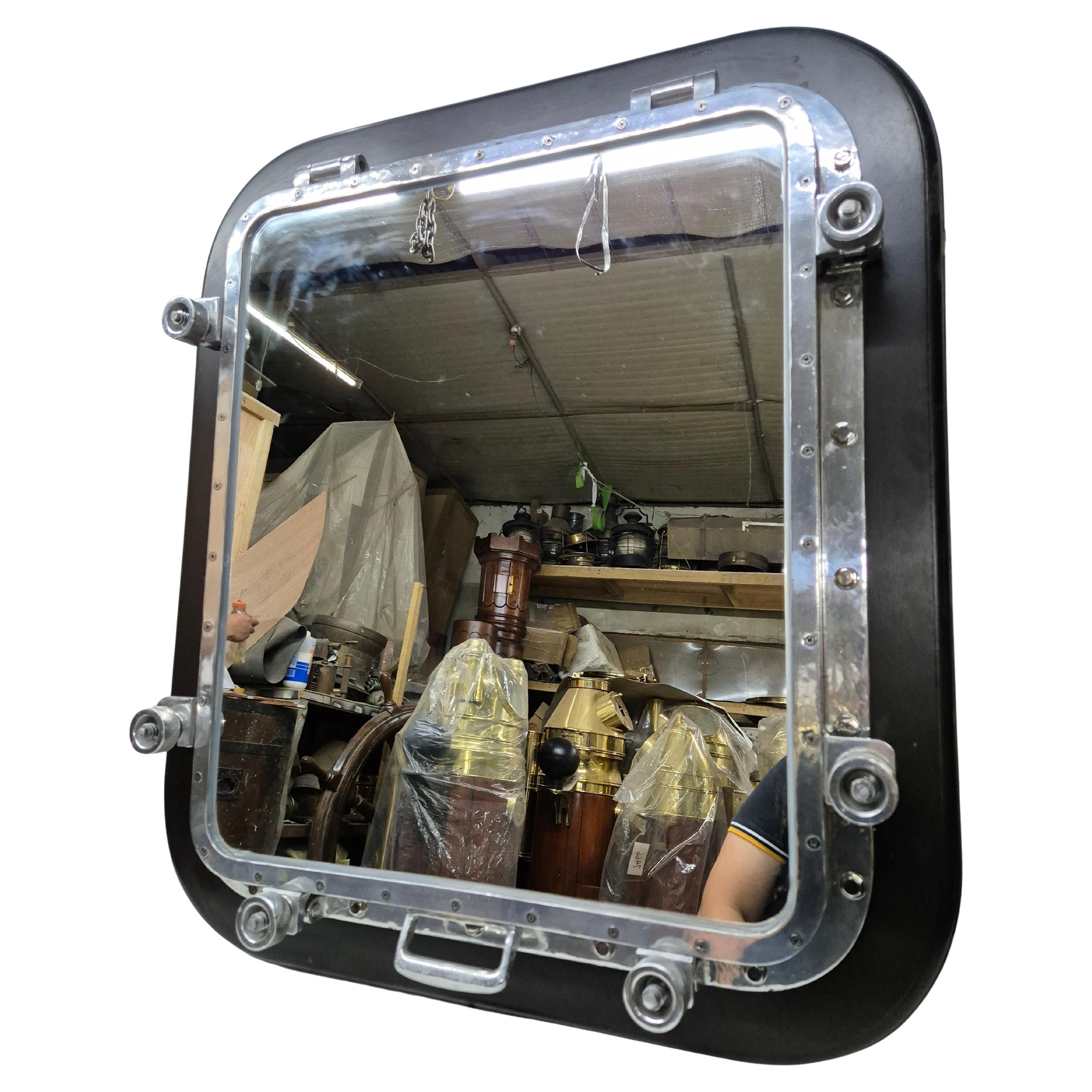 Ship's Porthole Transformed into a Wall Mounted Mirror For Sale