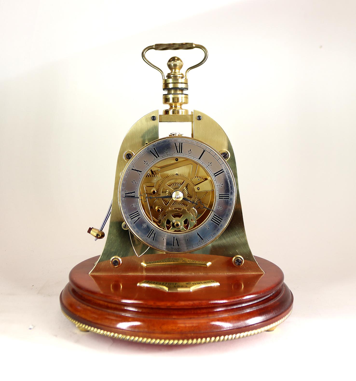 A very rare limited edition ships striking clock made for Mappin and Webb By Devon Instruments, to a design originally by Charles Frodsham & Co.

This clock is a faithful copy of the Ship’s Bell Clock made by Charles Frodsham for the Festival of