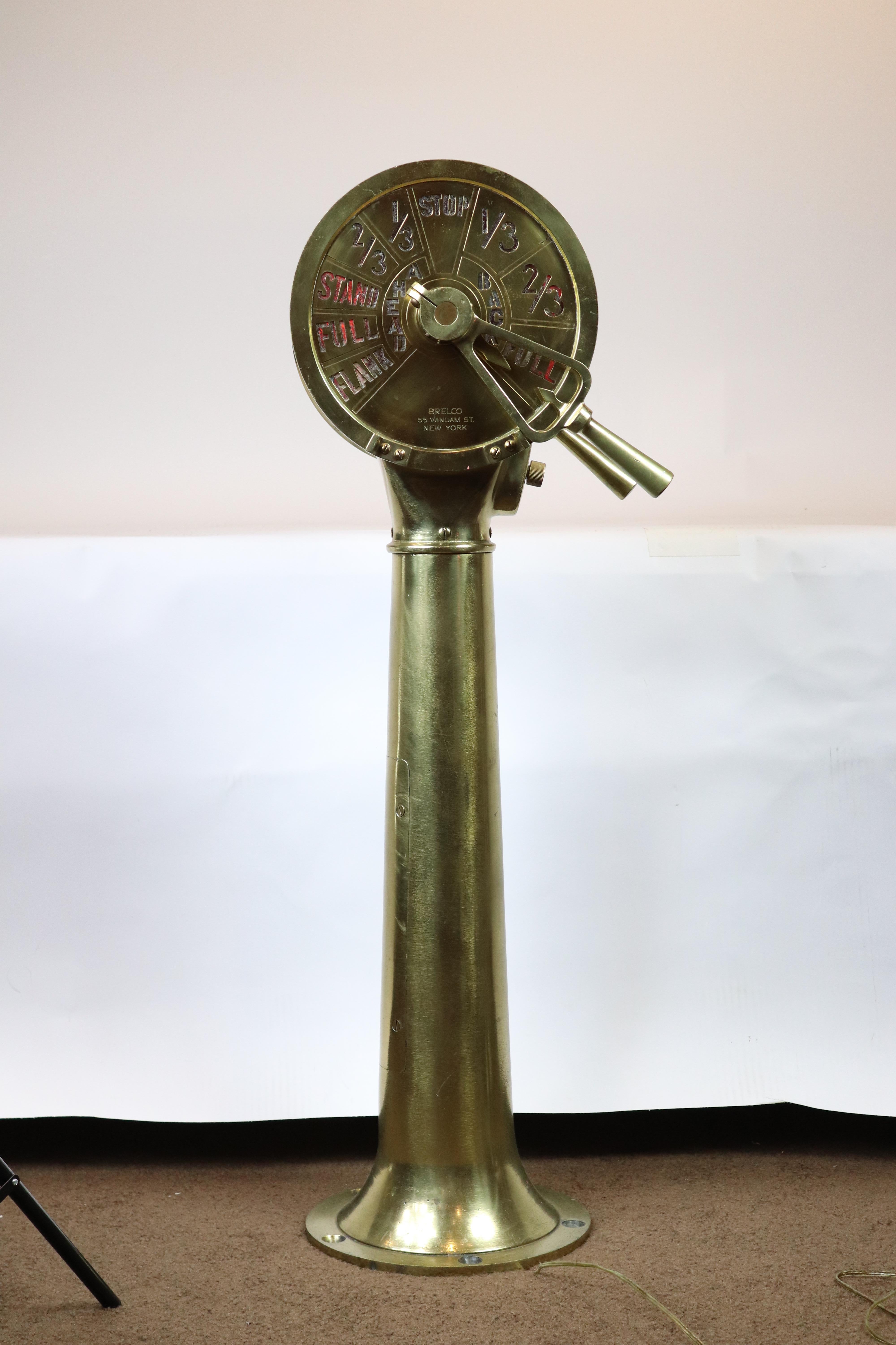 Solid brass, polished ship's telegraph by Brelco, 55 Vandam St., New York. With brass faceplates. Ships commands for 