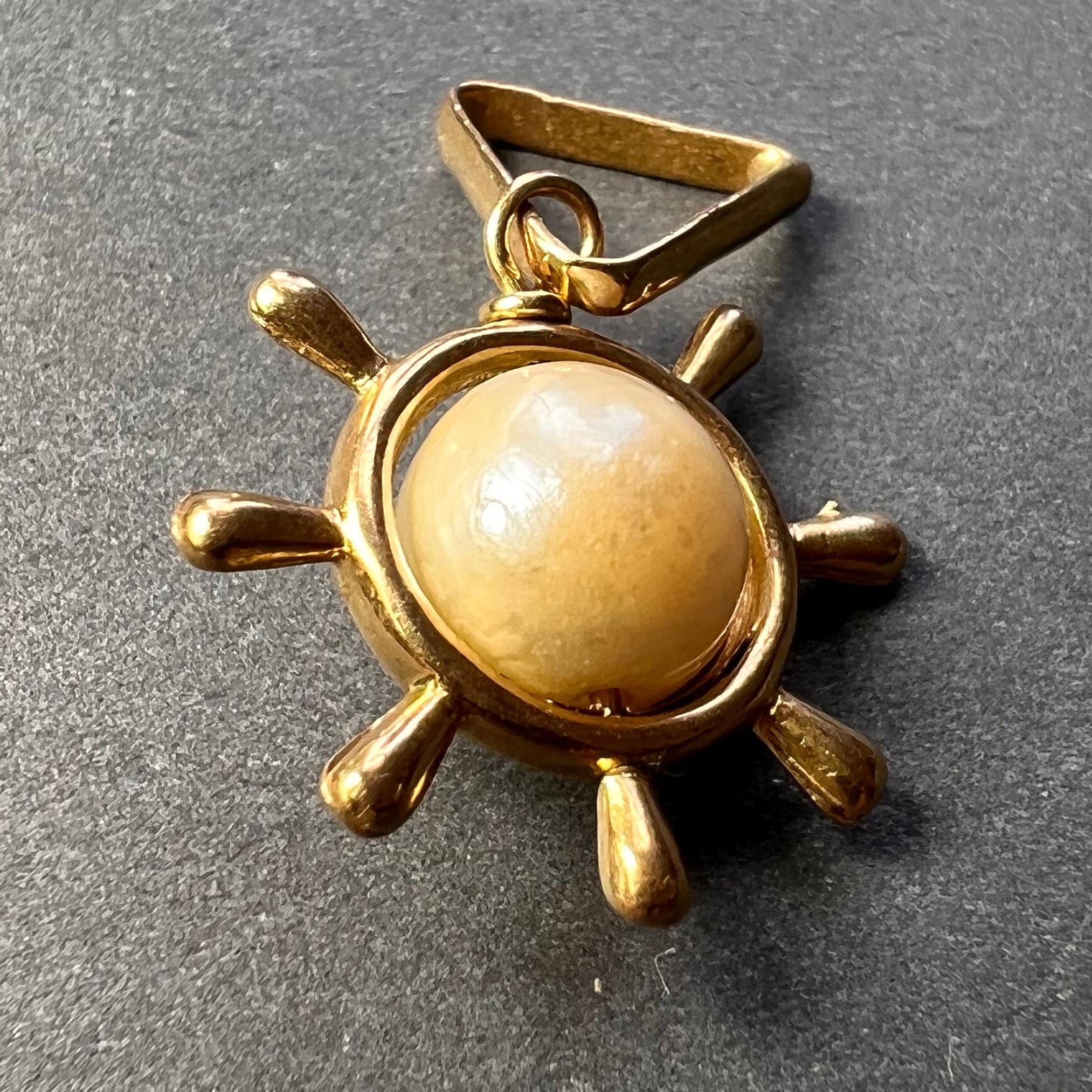 lord surya gold pendant
