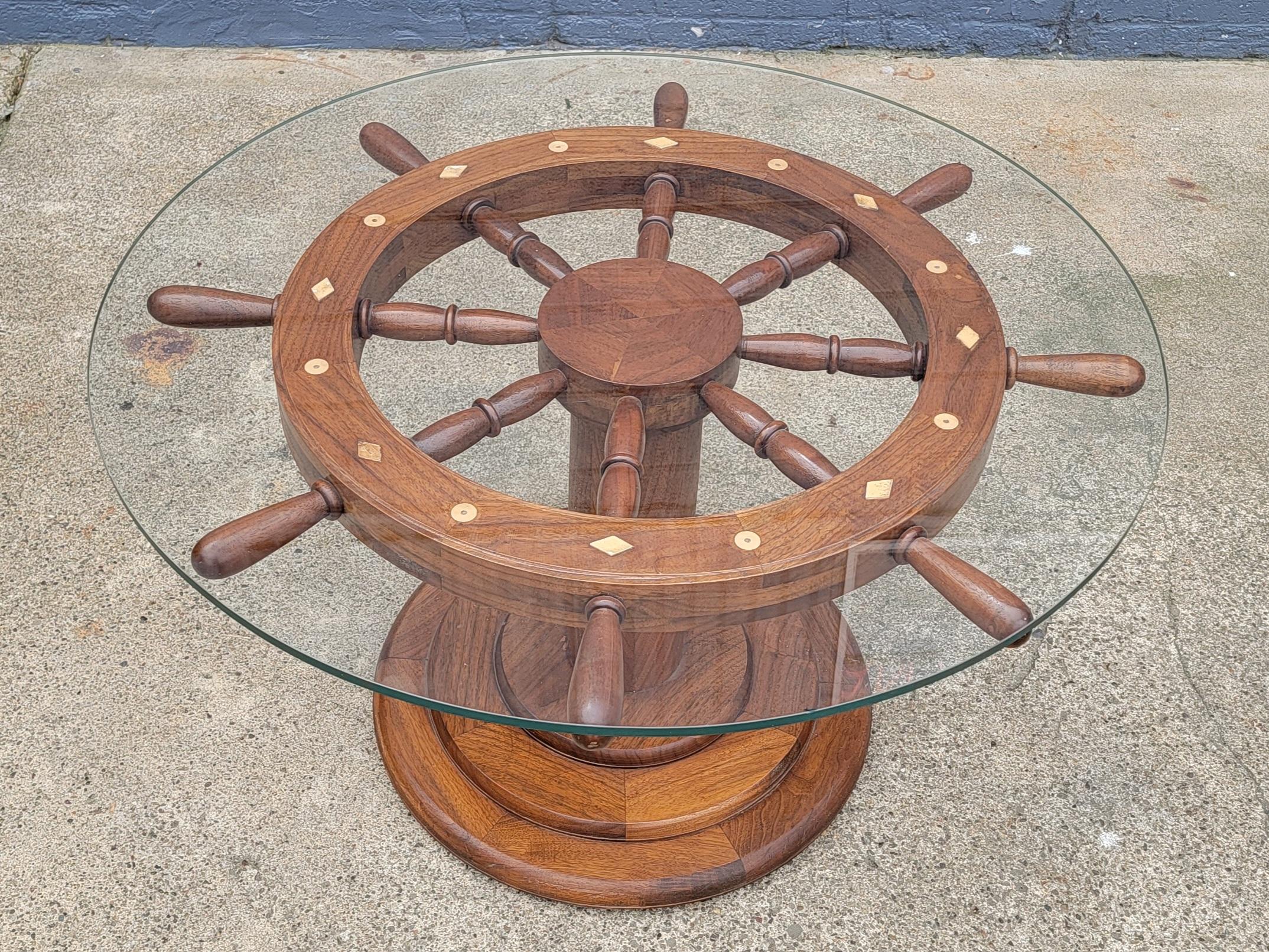 Nautical theme ships wheel coffee or side table. Fine joinery and craftsmanship. Crafted in solid walnut. Includes circular glass top.