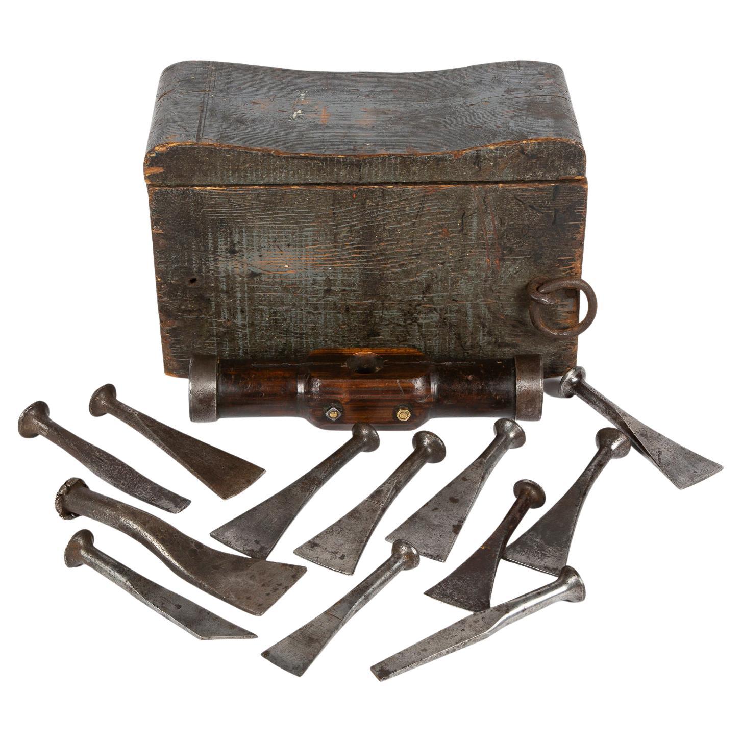 Shipwright's Calking Seat, Containing a Mallet Head and 12 Steel Calking Tools For Sale