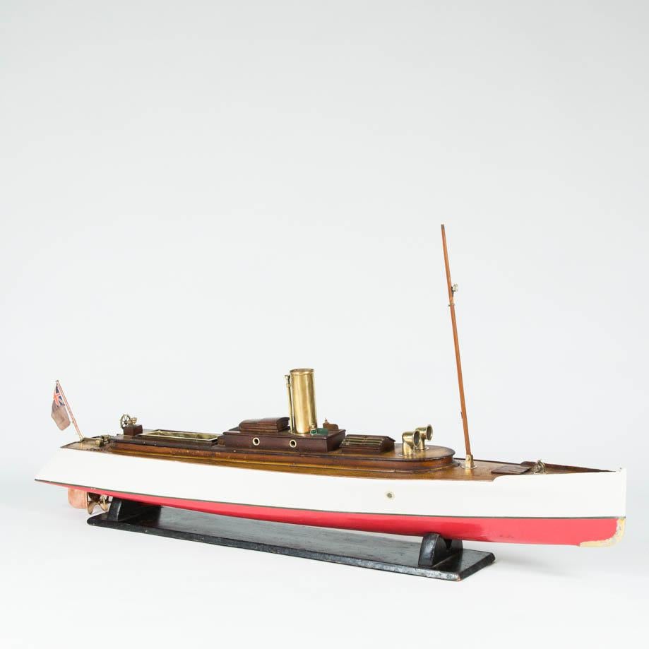A very fine working model of a steam launch built by Robertson & Sons shipyard. Sandbank, Argyll. 

Interior painted with BUILT ROBERTSON AND Co's SHIPYARDS 

Powered by a steam engine, pressure gauge marked: lbs per Sq in - BONDS 

With plain
