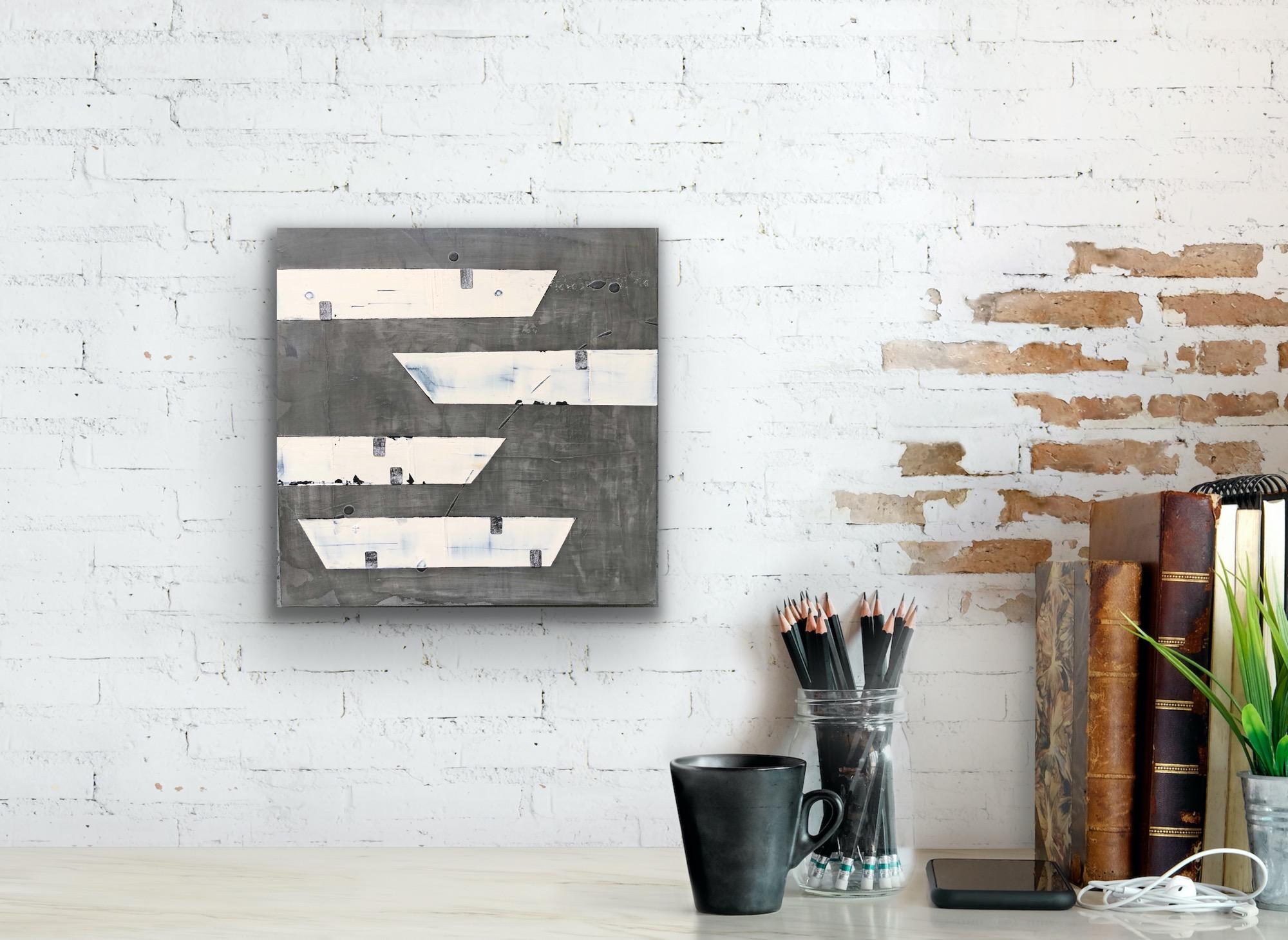 Clean and modern in it’s design and imagery, yet rich and luscious in the surfaces and texture, there is much more to meet the eye with these contemporary minimalist paintings made from venetian plaster and pigment. The crisp white and gray