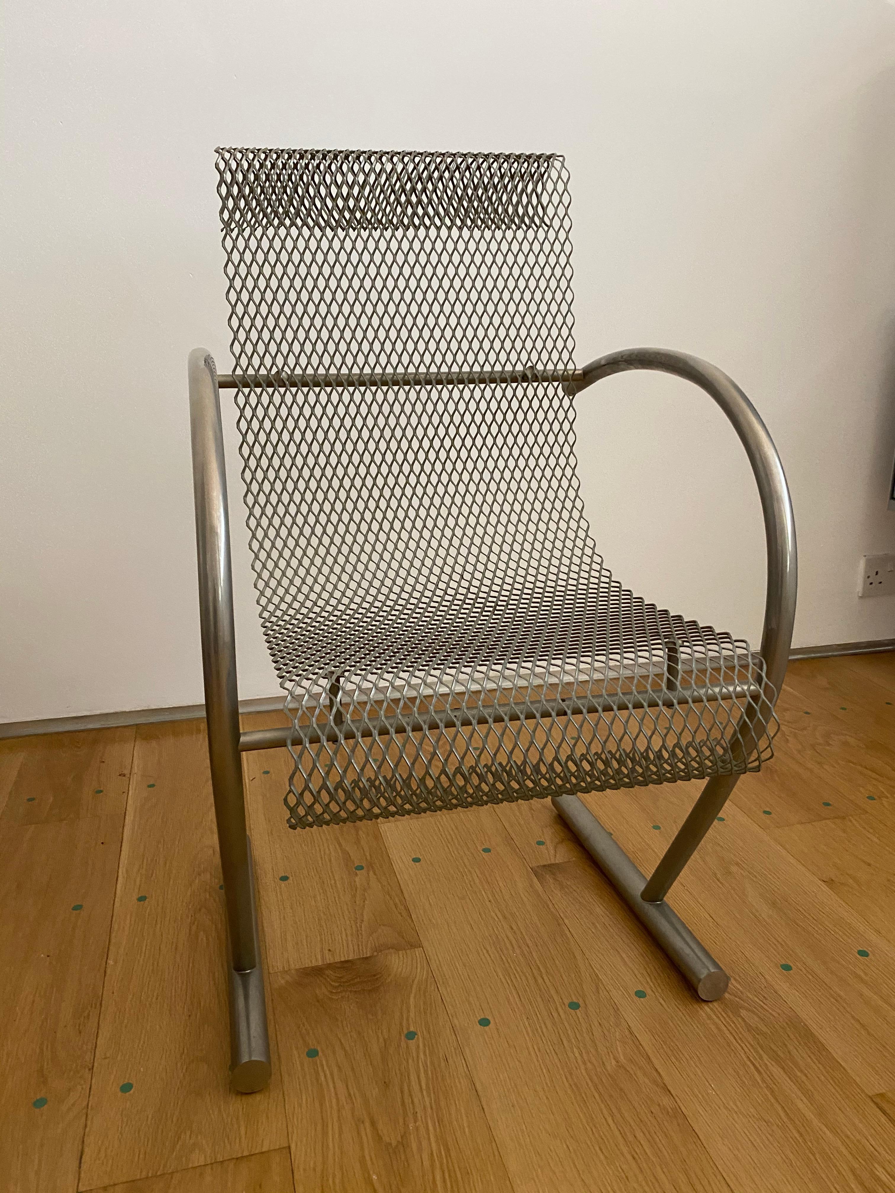 Sing Sing Sing chair designed by Shiro Kuramata in 1985 in France and produced by XO, co-founded by Philippe Starck. Expanded metal, silver-grey coated tubular steel. 

In good original condition. 

Born in Tokyo in 1934, Shiro Kuramata attended