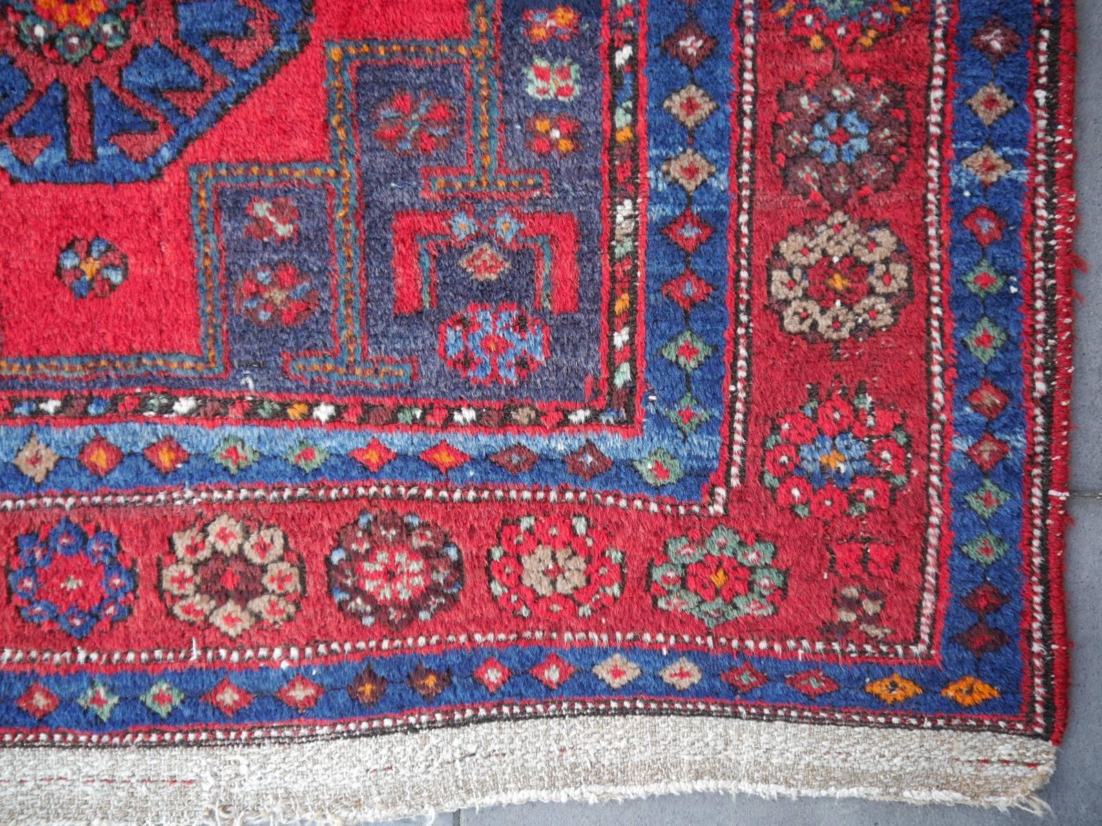 Hand-Knotted Shirvan Caucasian Vintage Carpet with Vibrant Colors Red Blue Orange Green