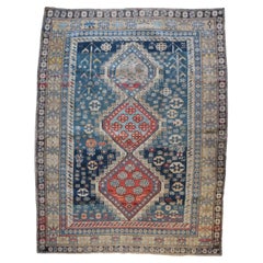 Shirvan Kazak with Soft Blue Field, Neutral Designs and Red Medallions c.1900