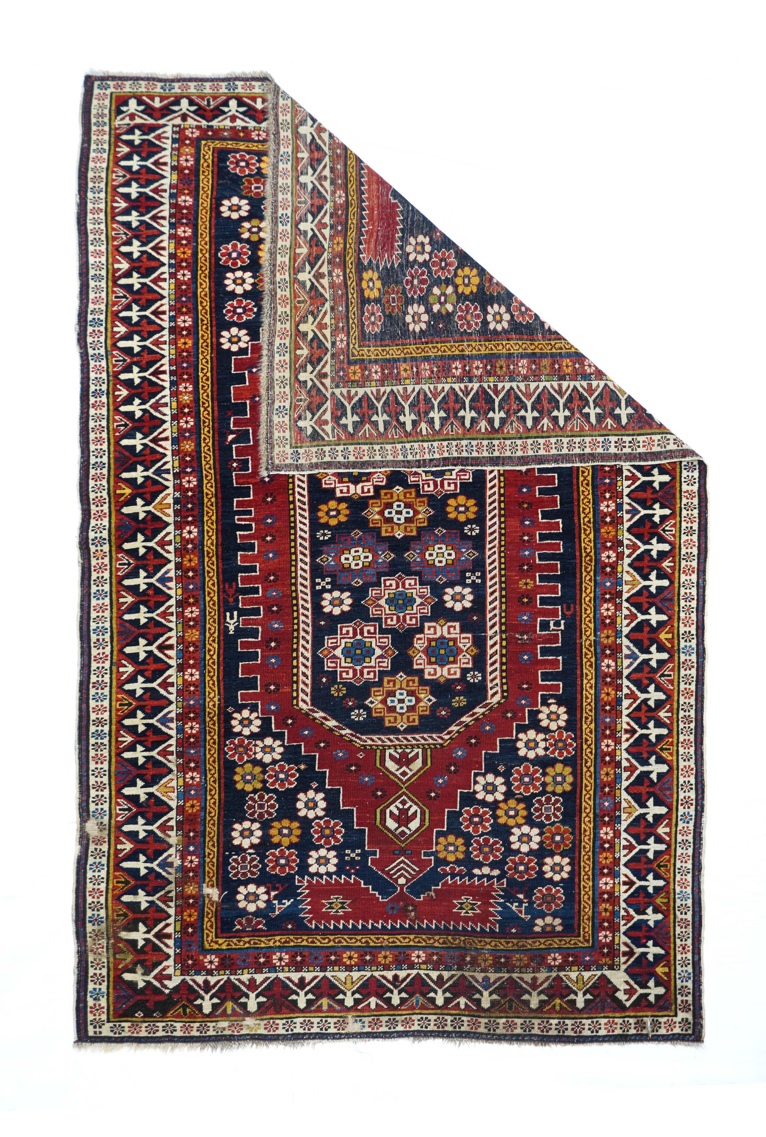 Antique Shirvan rug measures 4'0'' x 6'9''.