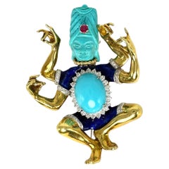 Broche Shiva de oro amarillo de 18 quilates y esmalte de turquesa
