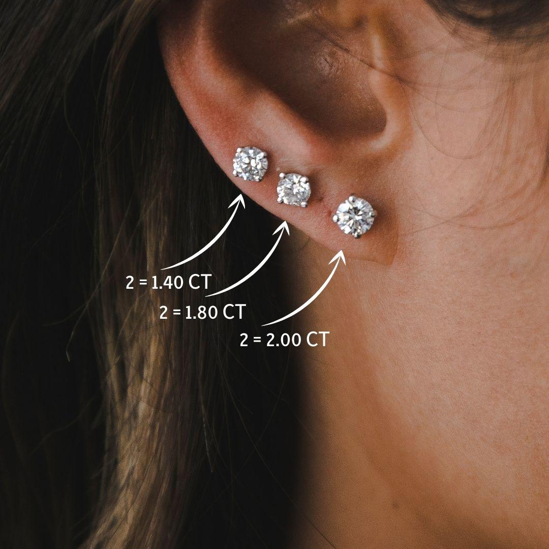 2.00 Carat Excellent Cut Extra Shiny Natural Diamond Studs Earrings 

The perfect diamond stud earrings, you will never take them off. The diamonds were hand picked by our designer for maximum light brilliance, shiny as diamonds should be, clear and