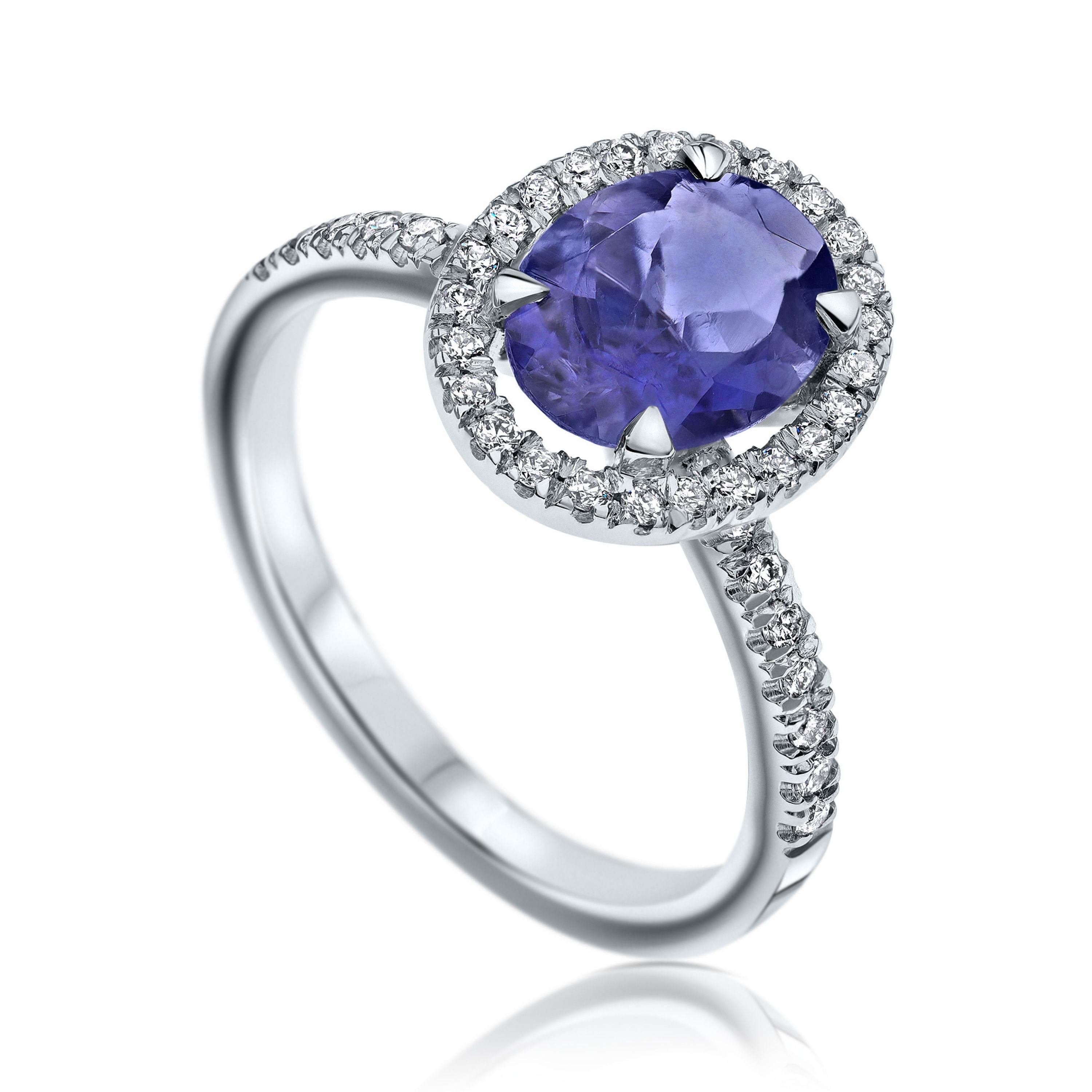 1.20 Carat Oval Tanzanite and Diamonds Halo Ring in White Gold - Shlomit Rogel

Oval shaped halo ring, set with a natural purplish 1.20 Carat Tanzanite gemstone. 
In the ring there are additional 40 diamonds set in a pavé-set, casting is 14K white