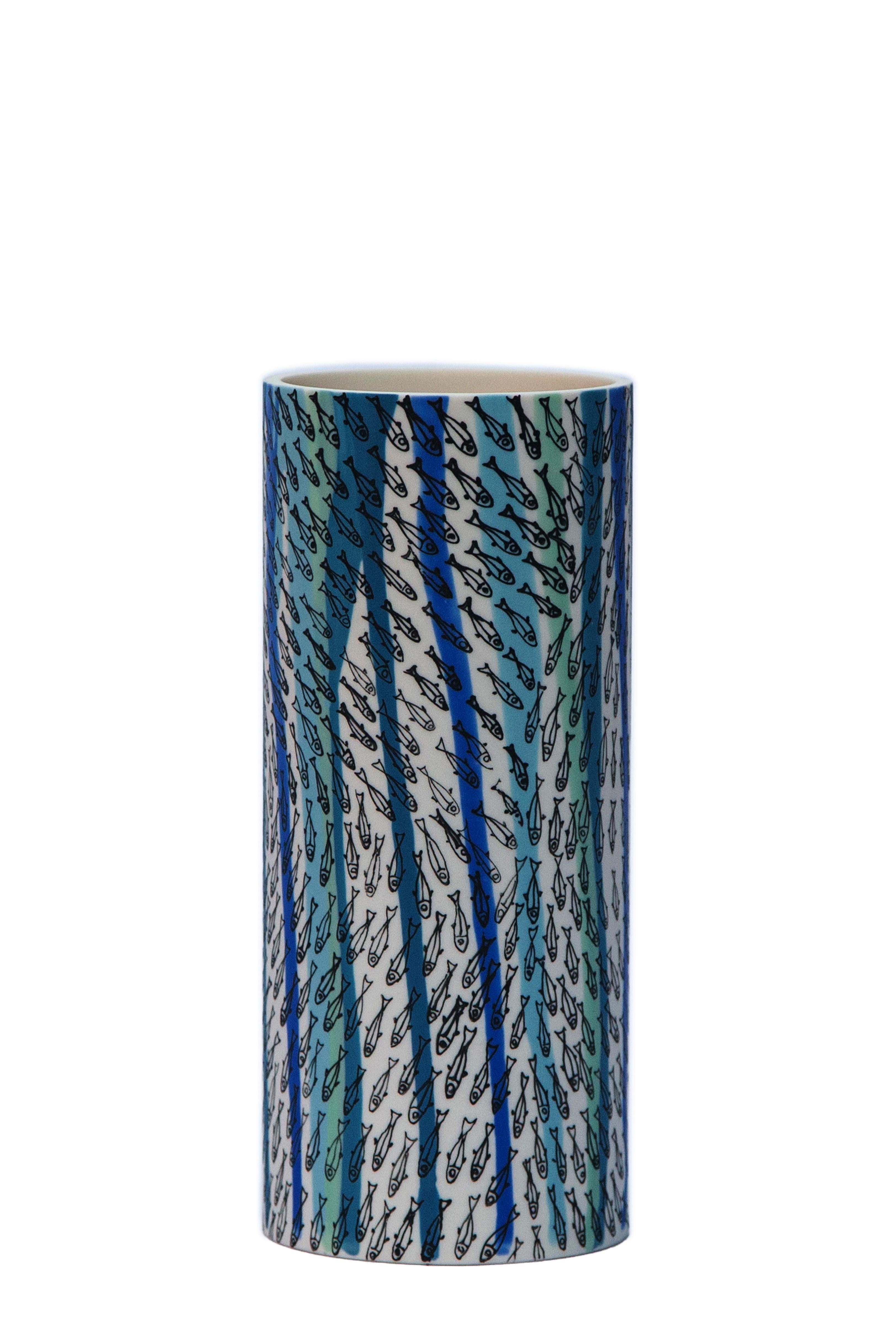 “Shoal of fish”, 2021 Porcelain vase by Eugenio Michelini - Parian ware, dripping stained slips, hand decorated with overglaze. Size = 8.5 x 19.5cm H
Unique piece handmade - 2 firings 

The focus of Eugenio Michelini (Italy, 1970) interest lies