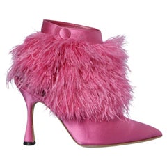 Used Shocking pink boots in satin and feathers Manolo Blahnik