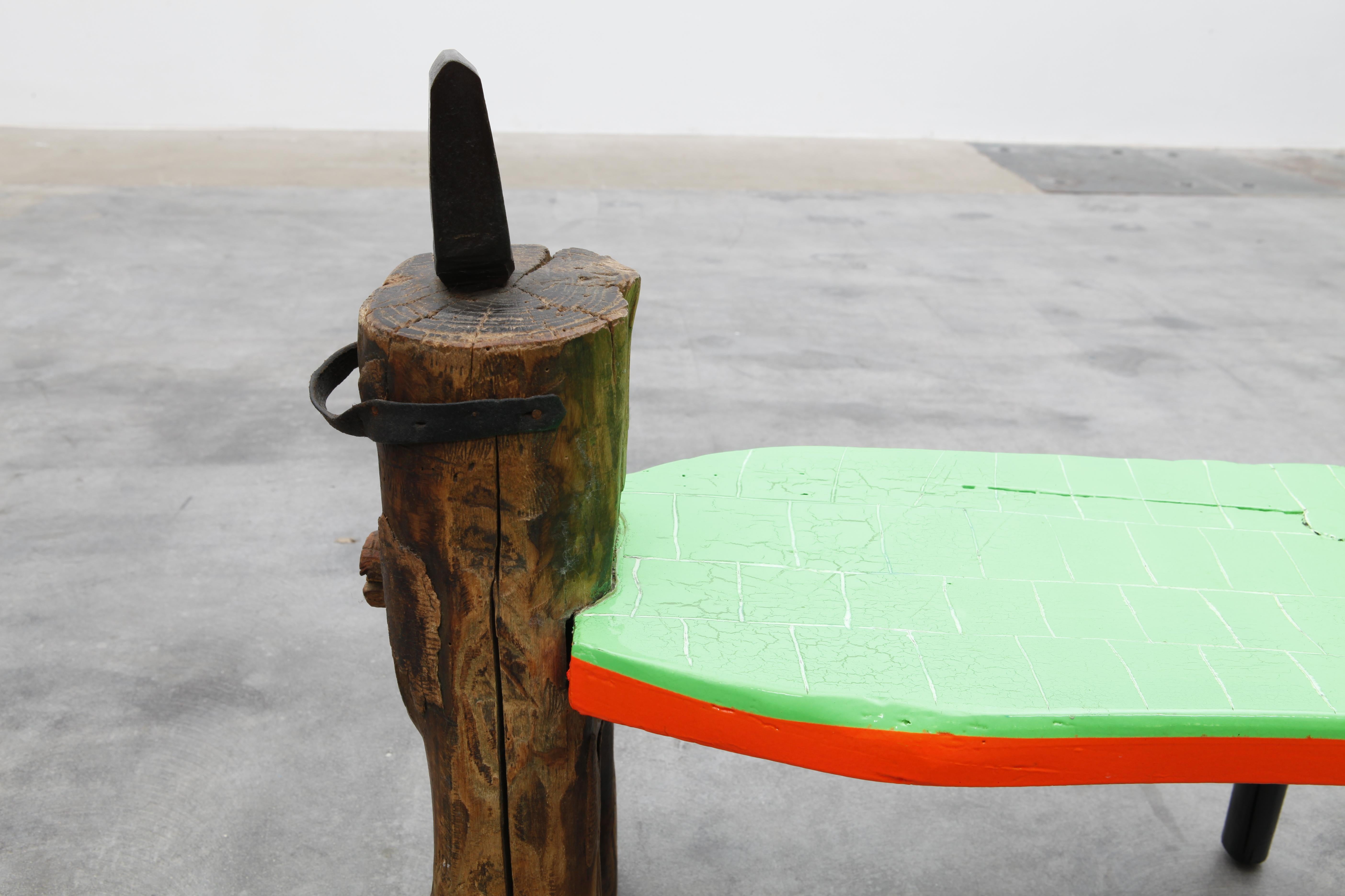 This redesigned ancient work stool has been abroaded, spraypainted in neon green and orange and finished in high gloss 2K lacquer. The piece combines modernity and ancient craftsmanship and works as a perfect item for your hallway, a conversation