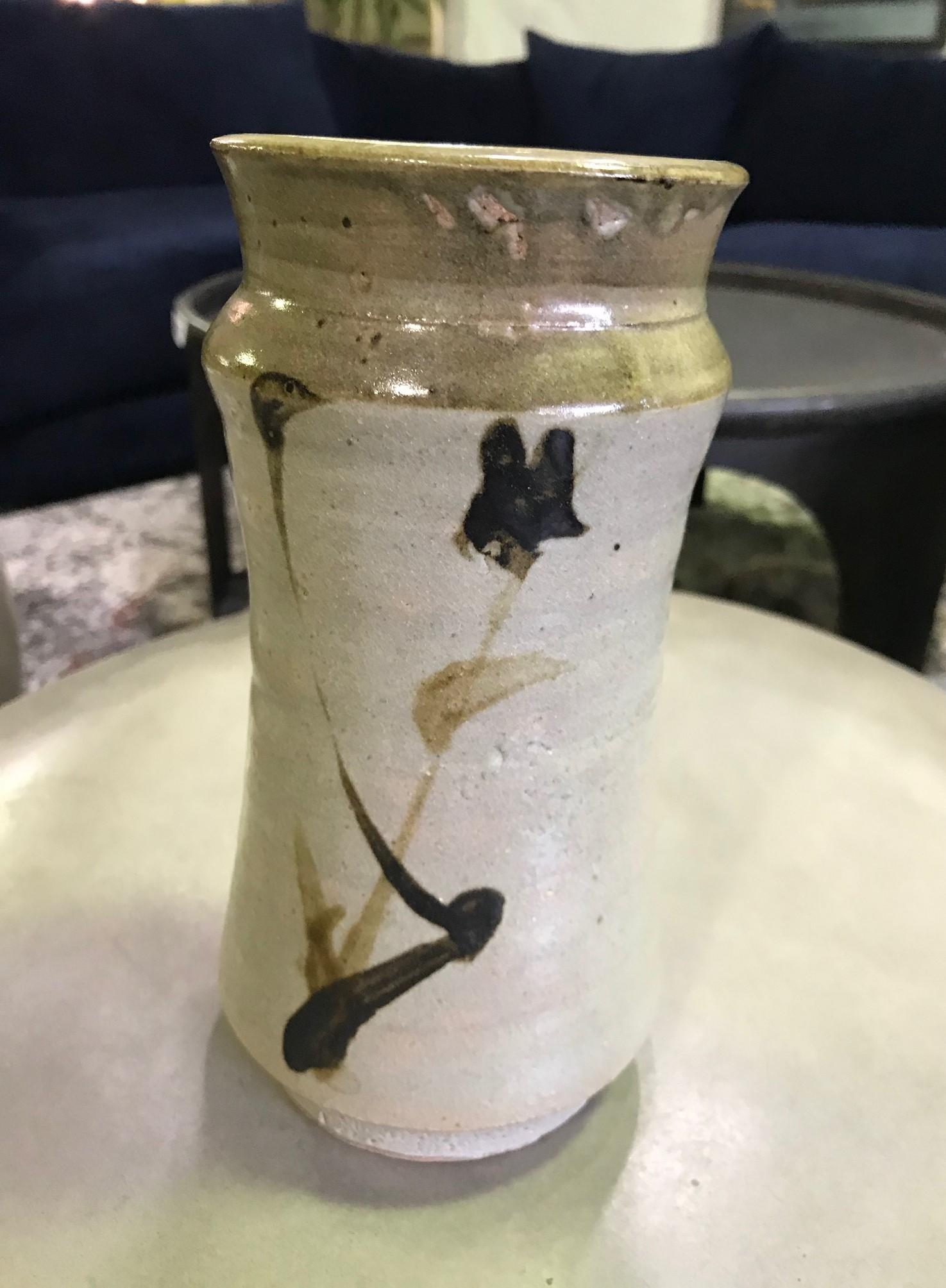 An exquisite, beautifully crafted and designed vase by master Japanese potter Shoji Hamada, a fine early example of his iron pigment and glazed tetsue brushwork with his bamboo hakeme motif. The original Hamada stamped/sealed and signed box is