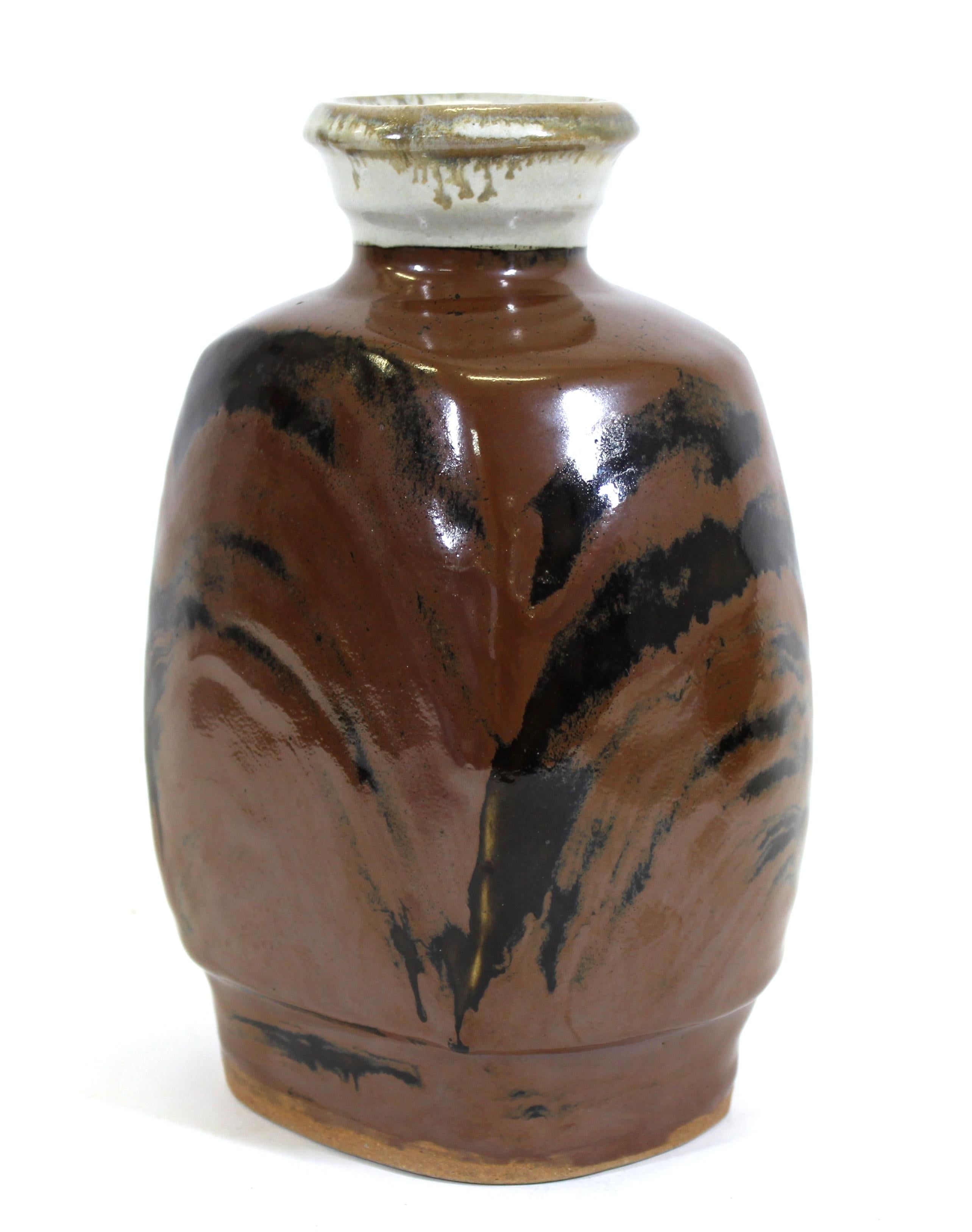Shoji Hamada style Japanese Mingei Kakiyu Mid-Century Modern bottle-shape vase with a rich kaki glaze, unsigned.