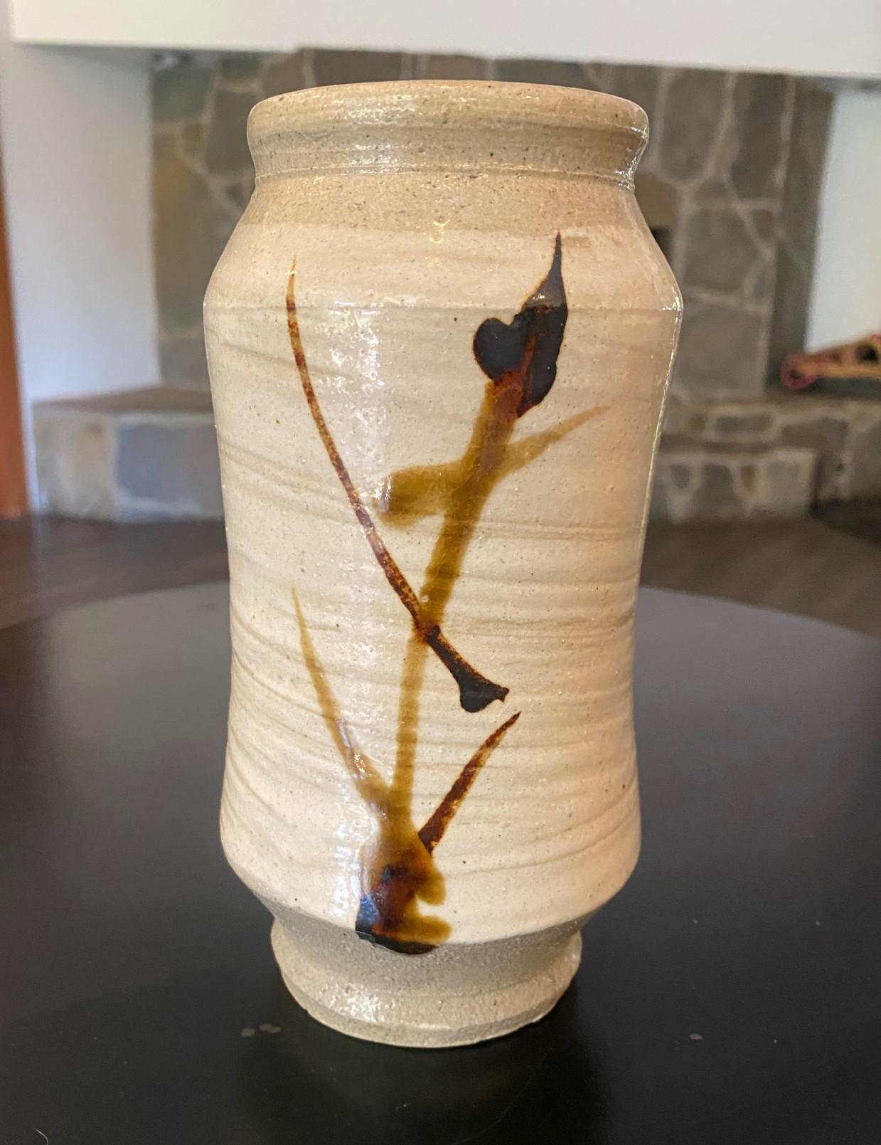 An exquisite, beautifully crafted and designed vase by master Japanese Mingei Moshiko potter Shoji Hamada, a fine example of his iron pigment and glazed hand painted tetsue brushwork with his bamboo hakeme motif (Hakeme is a Japanese pottery