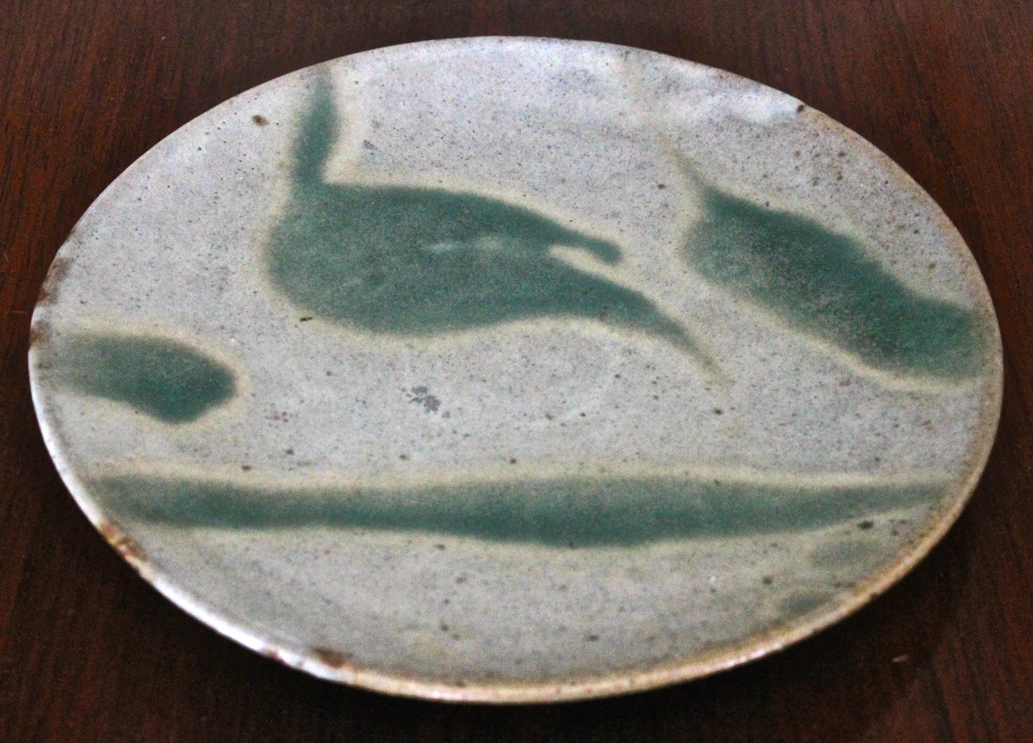 Important unique plate, hand painted green on light grey. Old label on bottom reads 'Hamada Plate'.
