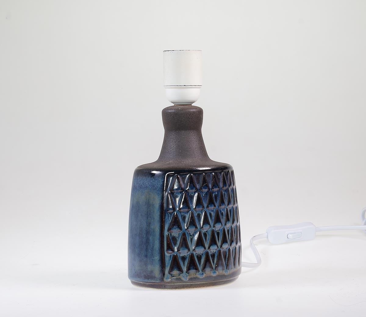 Danish design ceramic handmade lamp base from Søholm Stentøj (= earthenware) Bornholm Denmark 1960s.

Model 1036, blue series.

Designed by Einar Johansen.

The lamp has a beautiful relief glazed with a deep blue and brown gloss glaze and a matte
