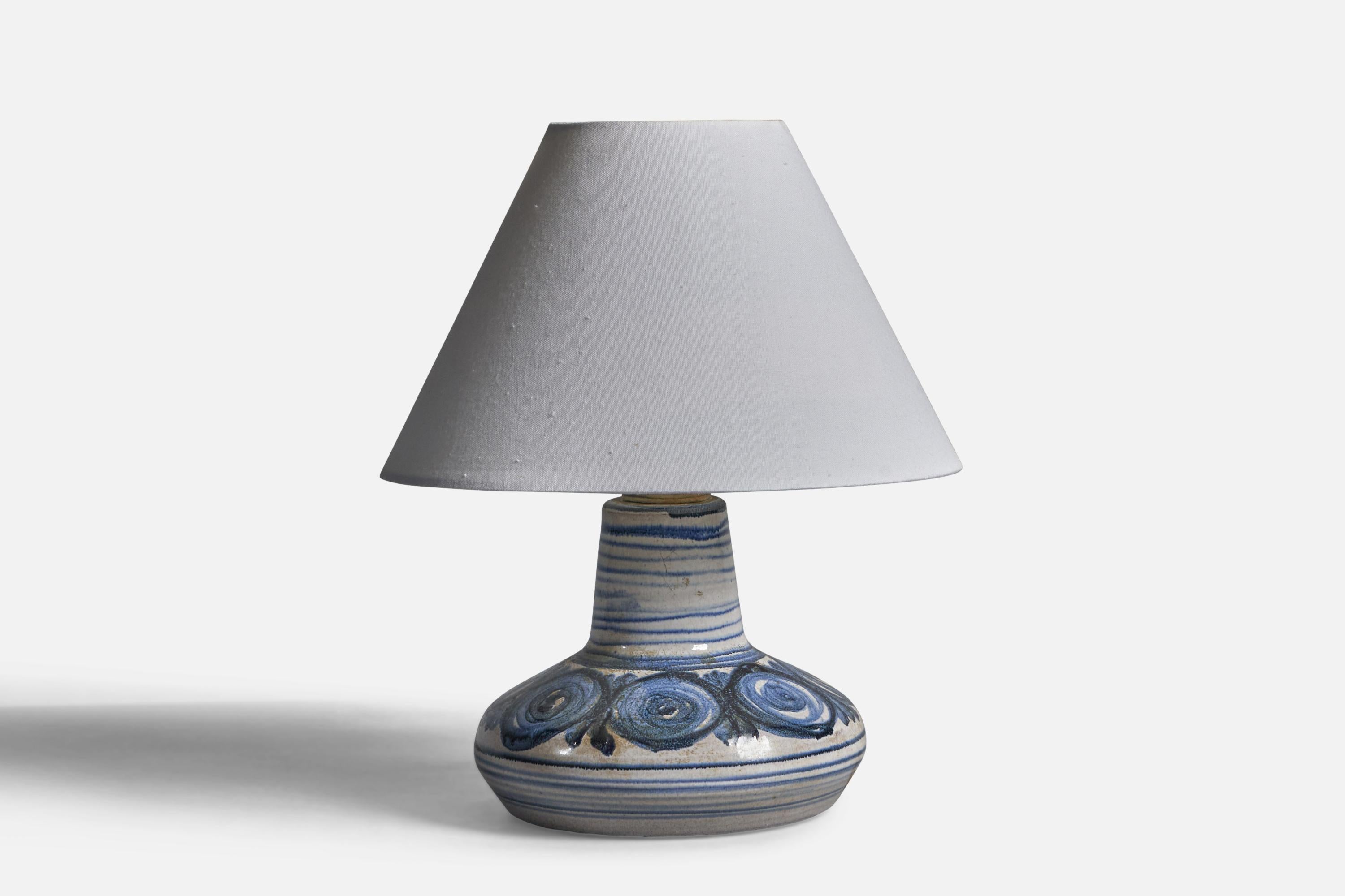 A small blue and off-white-glazed stoneware table lamp, designed and produced by 
Søholm, Bornholm, Denmark, c. 1960s.

Dimensions of Lamp (inches): 7.5