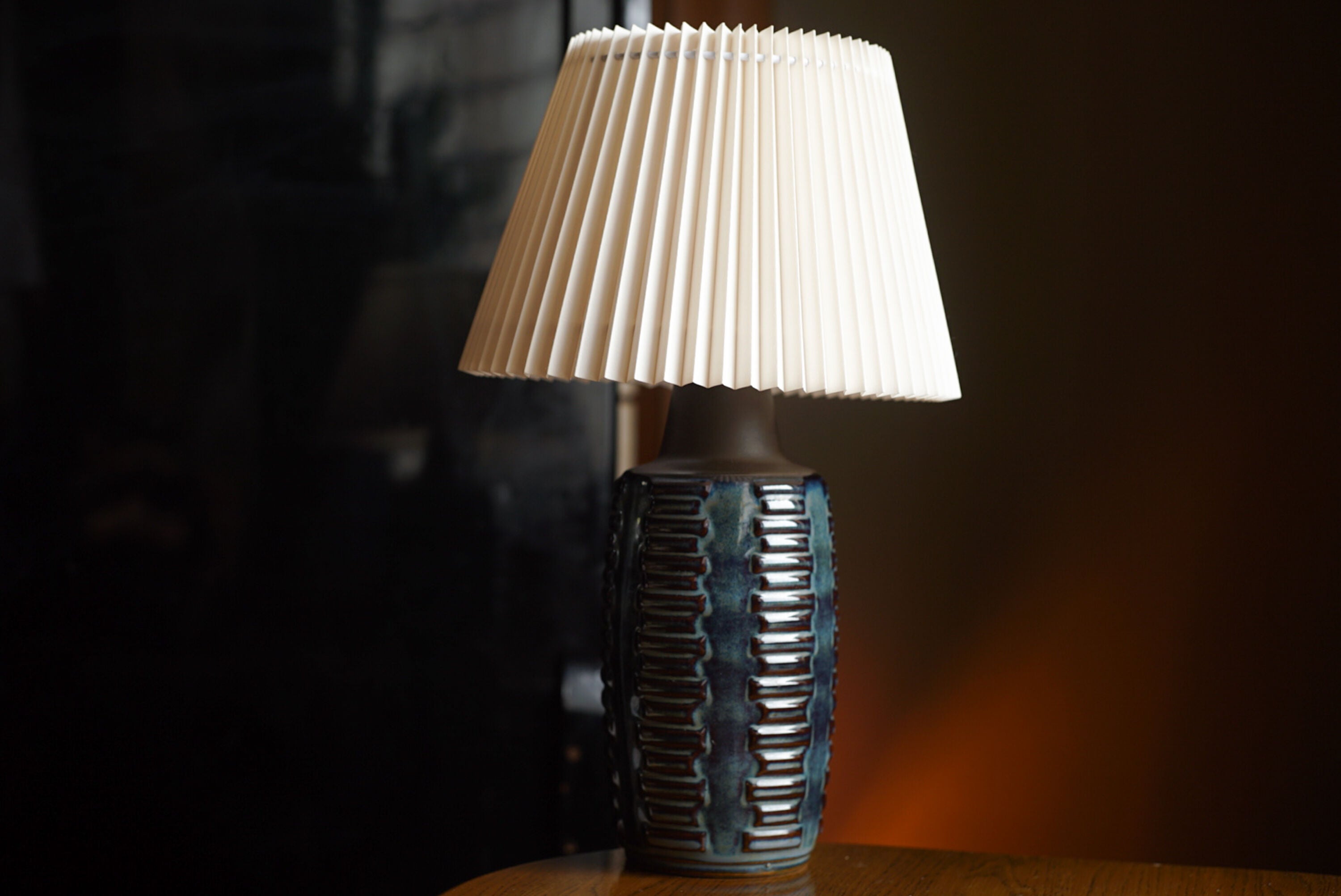 A stoneware table lamp handmade in the 1960s. Søholm is located on the island of Bornholm in Denmark.

Stamped and signed on the base.

Sold without lampshade. Height includes socket. fully functional and in beautiful condition.