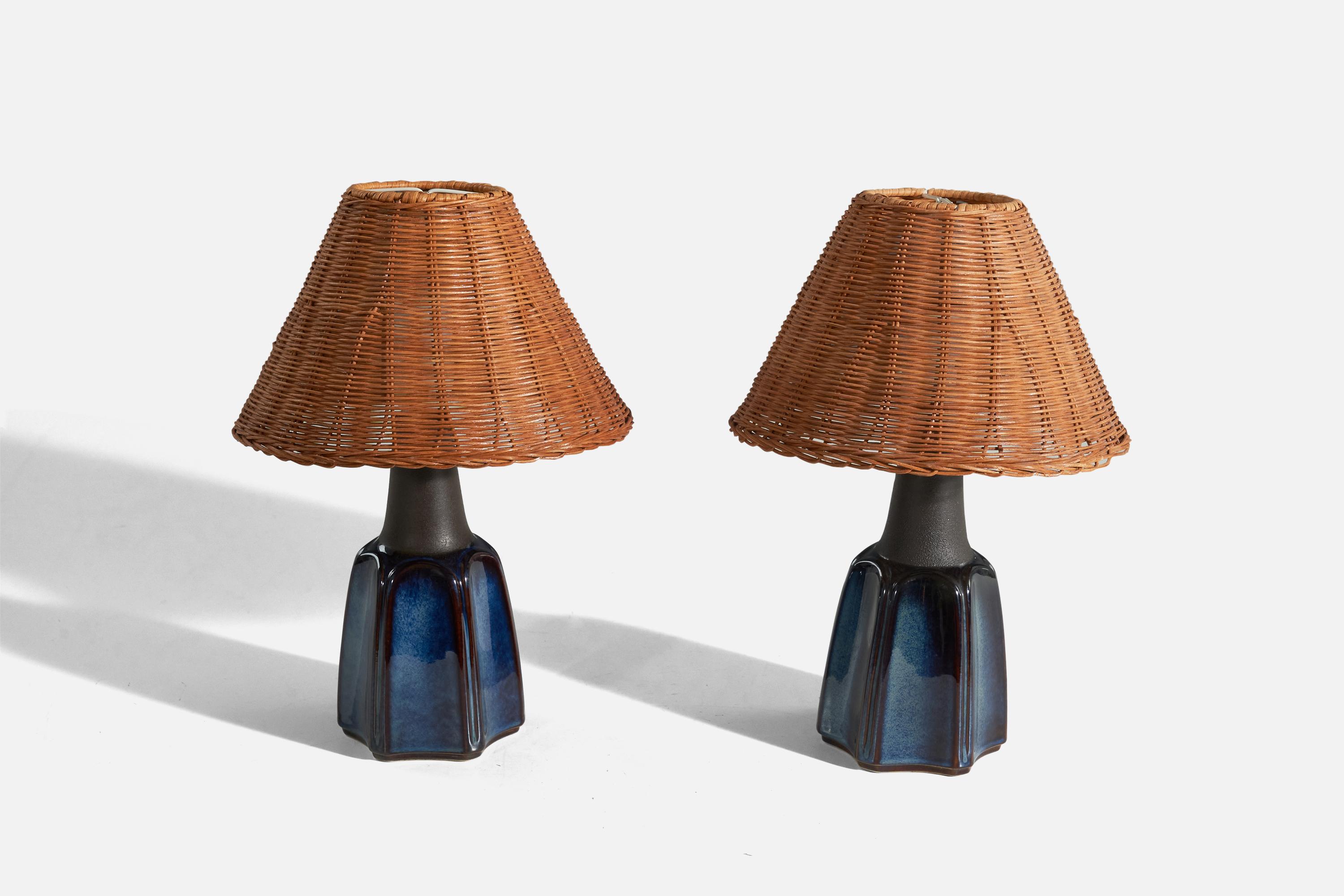 A pair of blue, glazed stoneware table lamps designed and produced by Søholm Stentøj, Bornholm, Denmark, 1960s. 

Sold without lampshades. 
Dimensions of Lamp (inches) : 10 x 4.14 x 4.14 (Height x Width x Depth)
Dimensions of Shade (inches) : 3.5 x