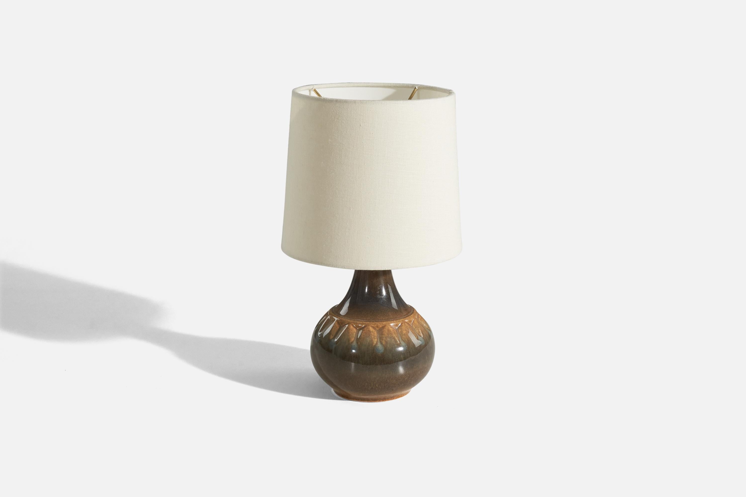 A pair of brown-glazed stoneware table lamps designed and produced by Søholm Stentøj, Denmark, 1970s.

Sold without lampshades. 
Dimensions of lamp (inches) : 9.43 x 5.87 x 5.87 (Height x Width x Depth)
Dimensions of shade (inches) : 7 x 8 x 7
