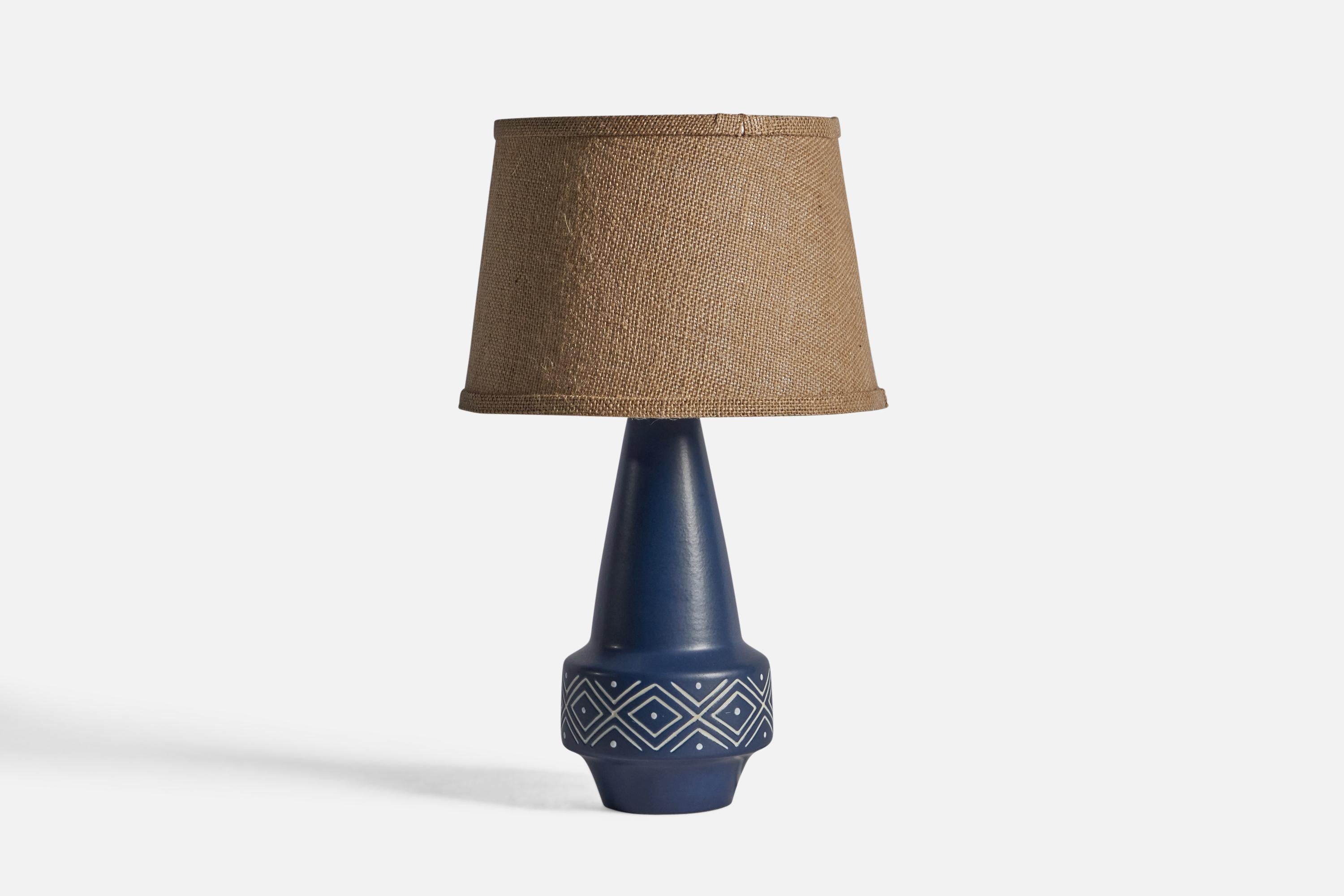 A blue-glazed table lamp designed and produced by Søholm, Bornholm, Denmark, c. 1960s.

Dimensions of Lamp (inches): 13.25
