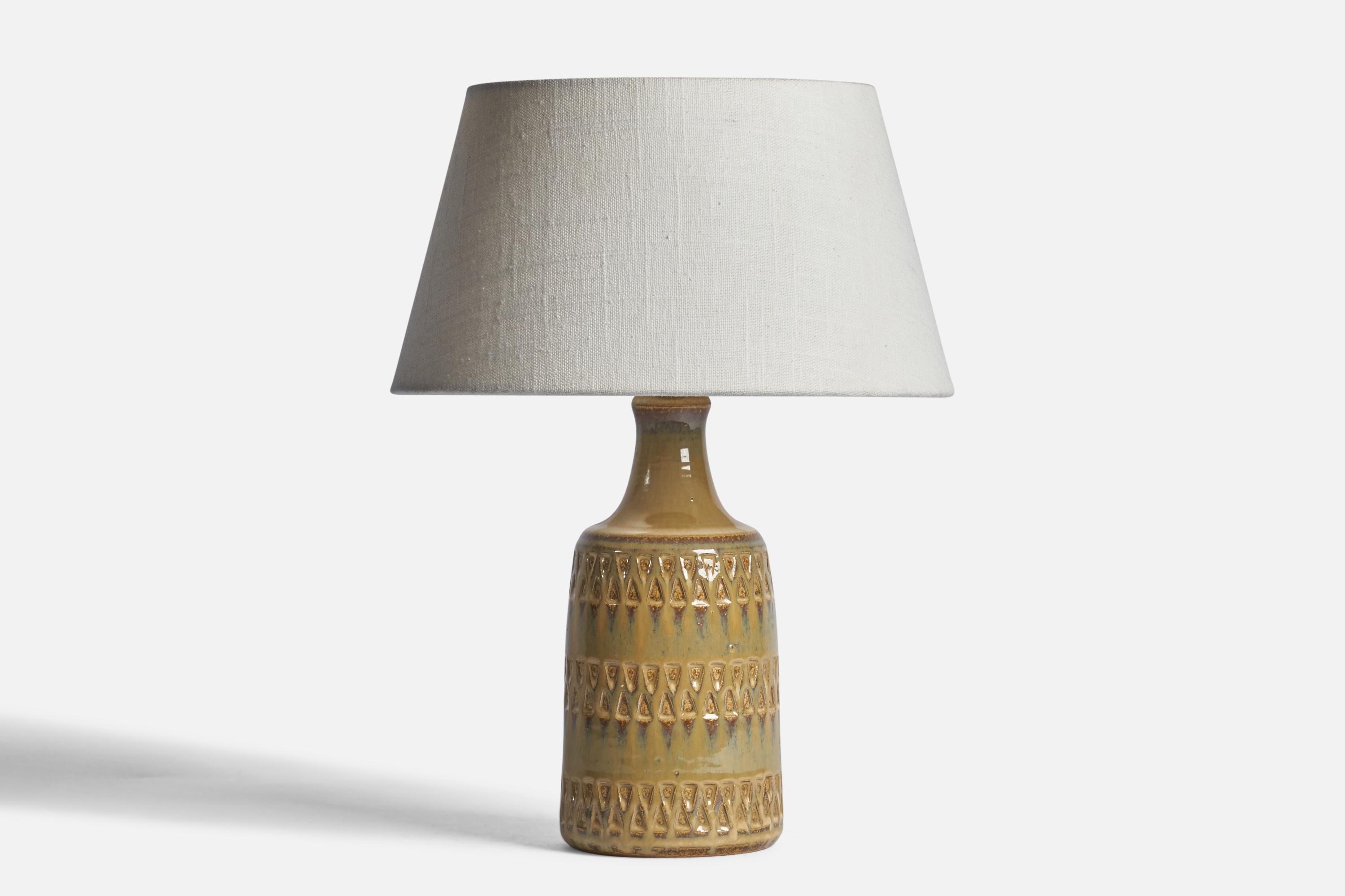A yellow-glazed stoneware table lamp designed and produced by 
Søholm, Bornholm, Denmark, 1960s.

Dimensions of Lamp (inches): 10.5