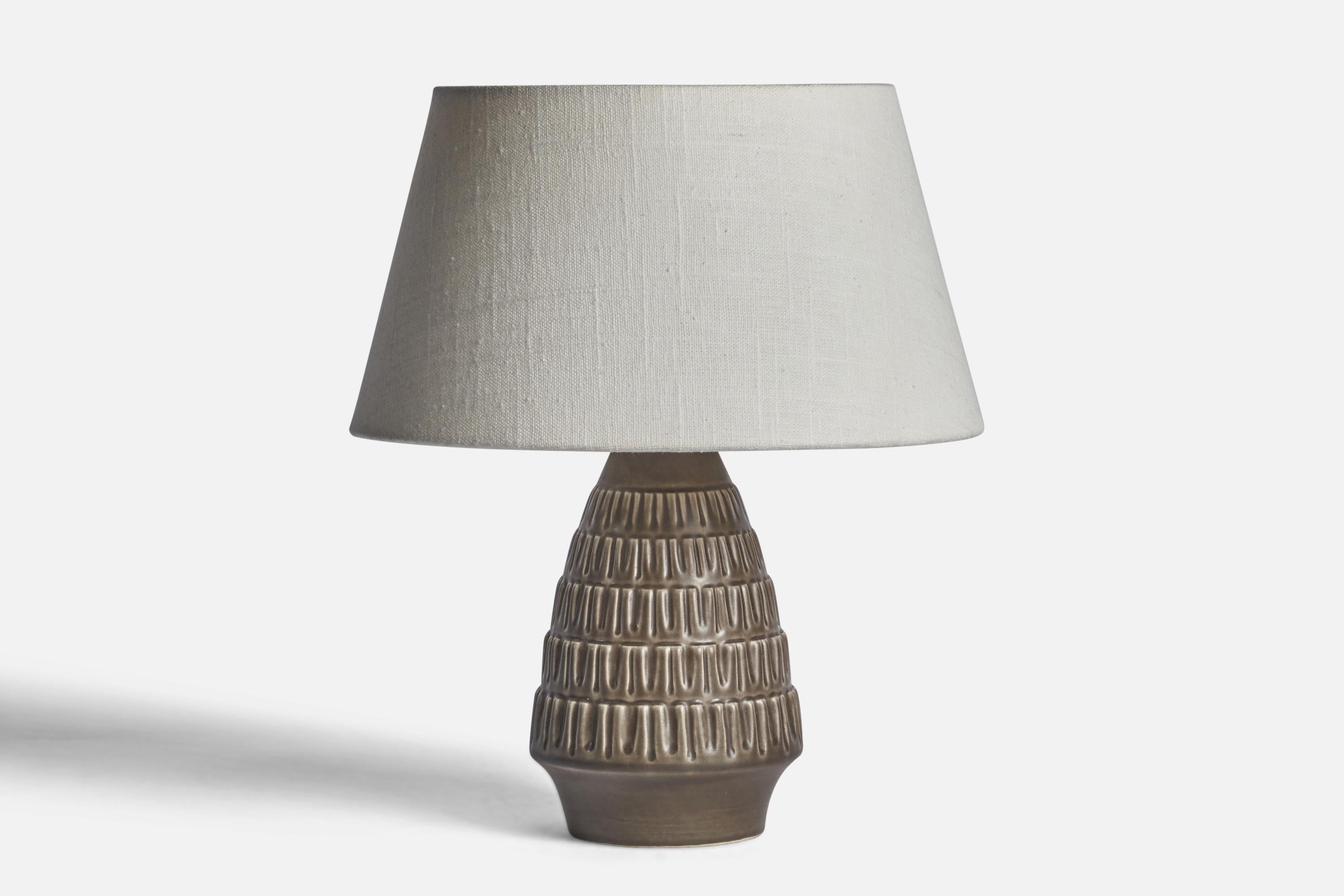 A grey-glazed stoneware table lamp designed and produced by 
Søholm, Denmark, 1960s.

Dimensions of Lamp (inches): 9.25” H x 4.45” Diameter
Dimensions of Shade (inches): 7” Top Diameter x 10” Bottom Diameter x 5.5” H 
Dimensions of Lamp with Shade