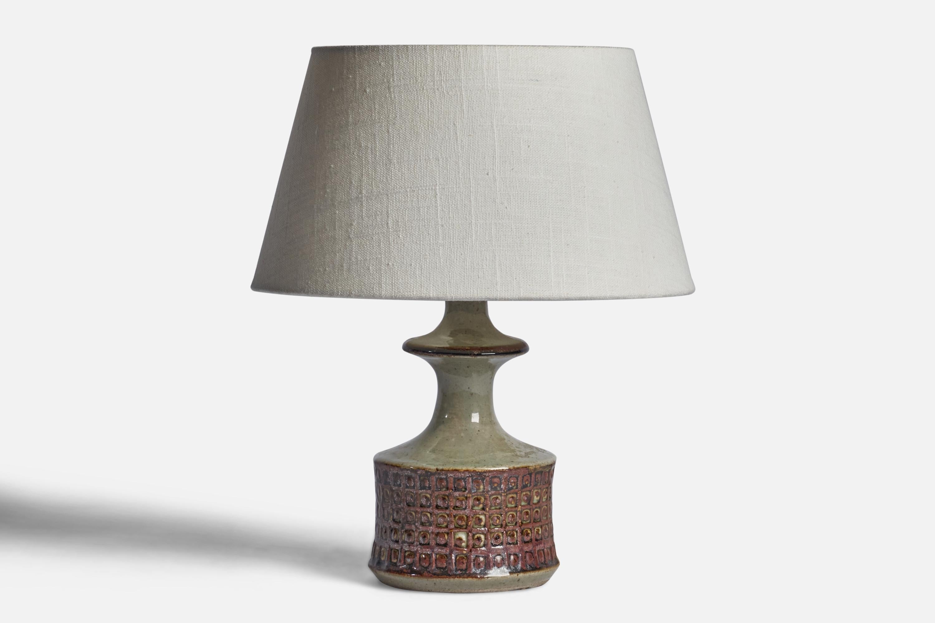 A brown and grey-glazed stoneware table lamp designed and produced by 
Søholm, Bornholm, Denmark, c. 1960s.

Dimensions of Lamp (inches): 9.45” H x 4.45” Diameter
Dimensions of Shade (inches): 7” Top Diameter x 10” Bottom Diameter x