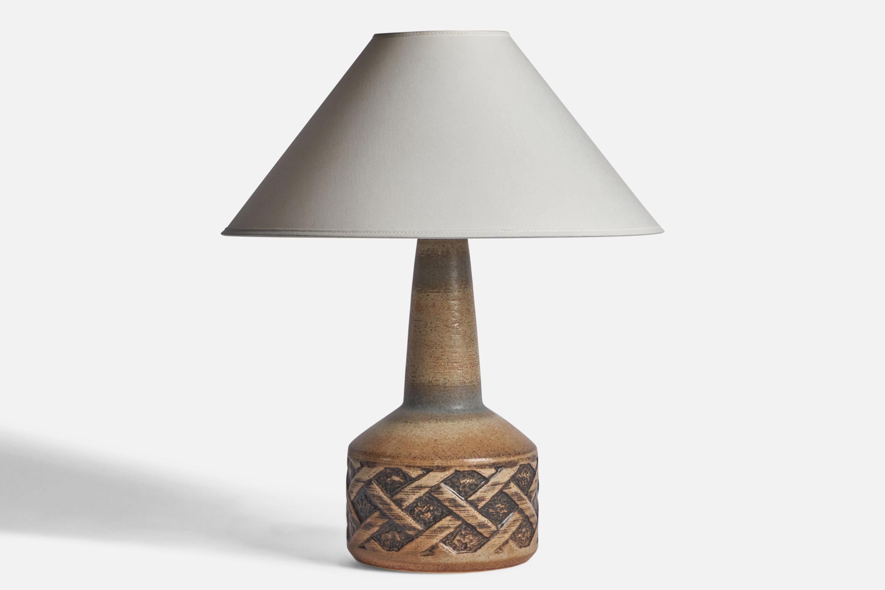 A grey and brown-glazed stoneware table lamp designed and produced by Søholm, Bornholm, Denmark, c. 1960s.

“1208-2” stamp on bottom
Dimensions of Lamp (inches): 15” H x 7.25” Diameter
Dimensions of Shade (inches): 4.5” Top Diameter x 16” Bottom