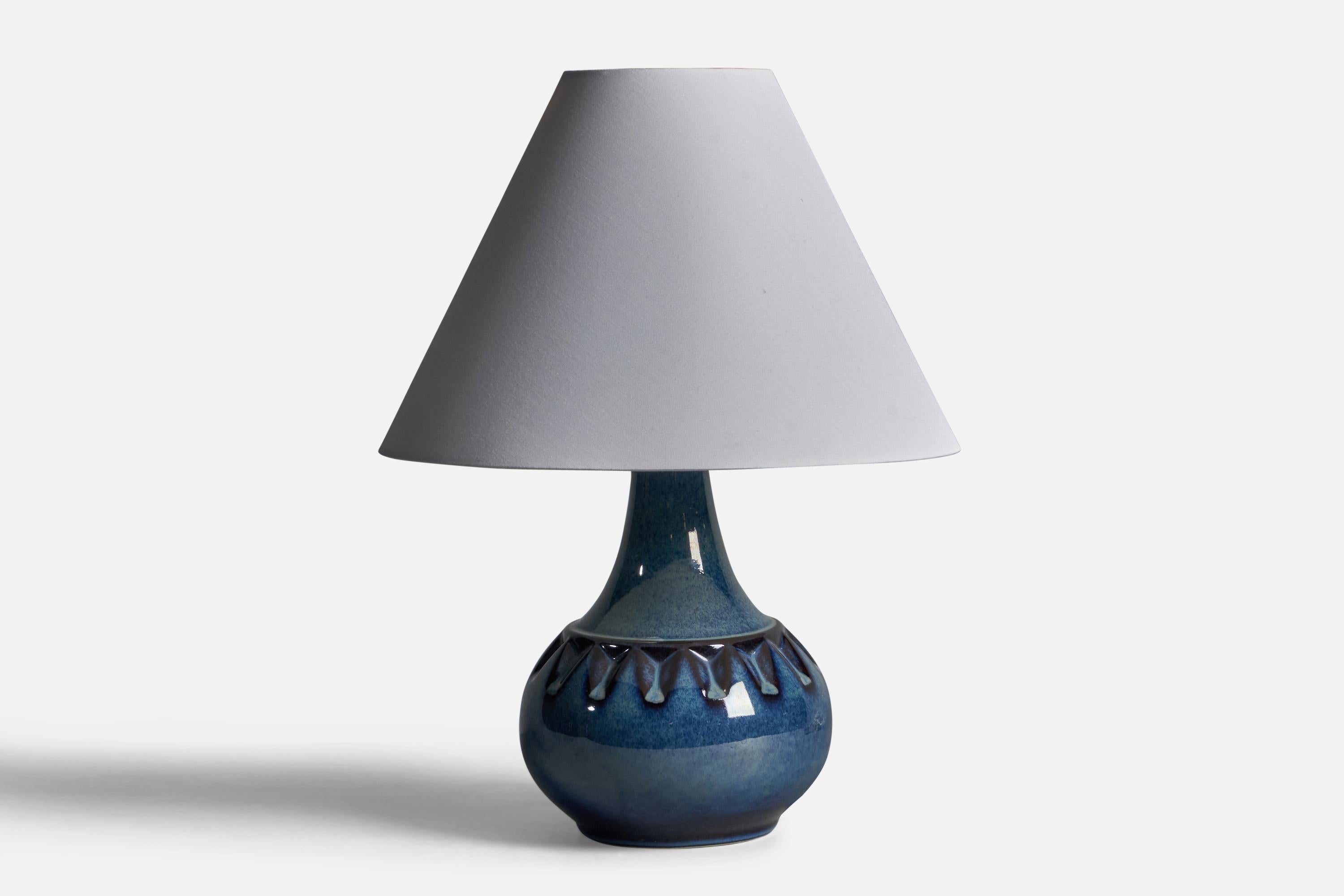 A blue-glazed stoneware table lamp designed and produced by  Søholm, Bornholm, Denmark, 1960s.

Dimensions of Lamp (inches): 10.25