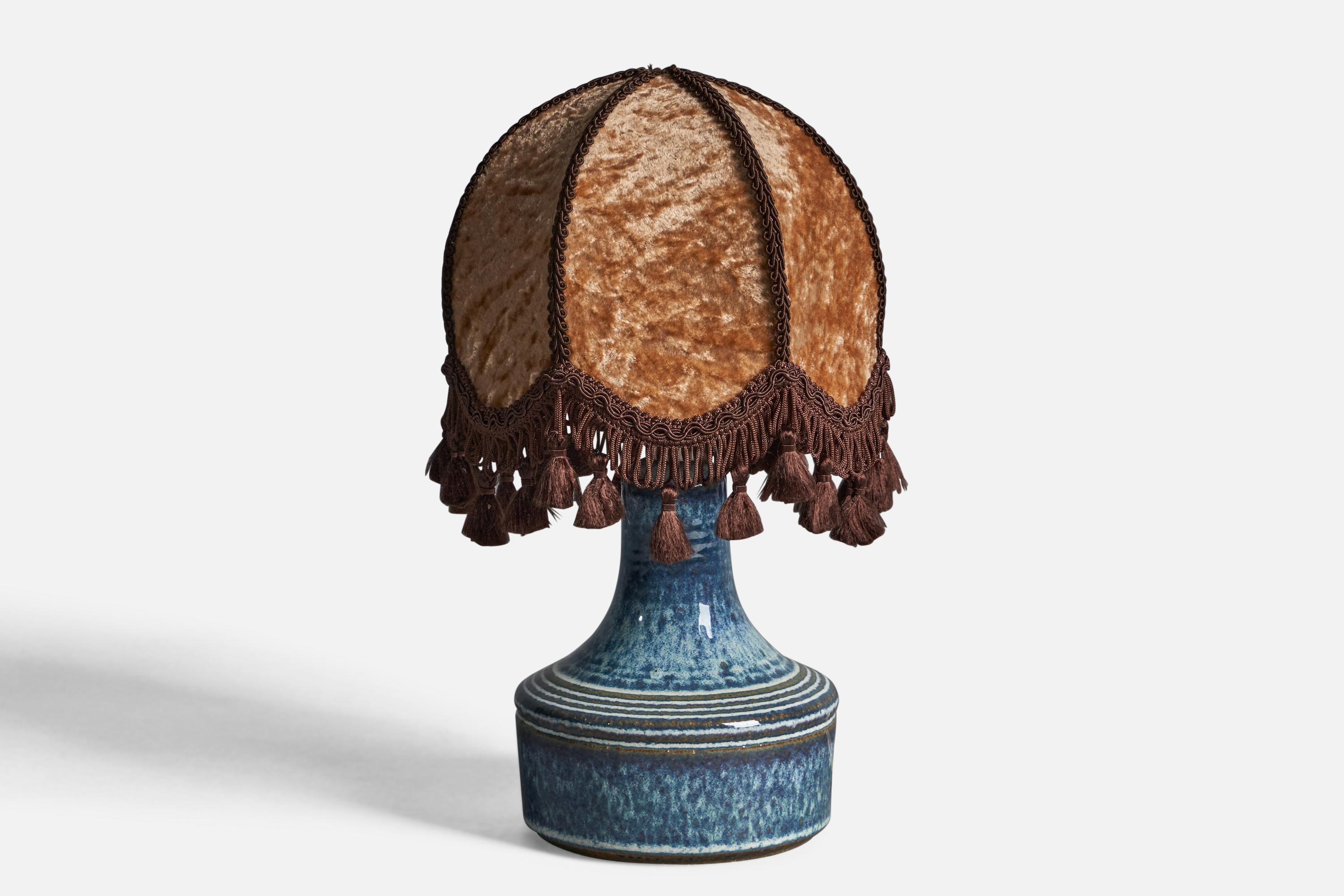 A blue-glazed stoneware and brown velvet fabric table lamp, designed and produced by Søholm, Bornholm, Sweden, 1960s.

Overall Dimensions (inches): 11