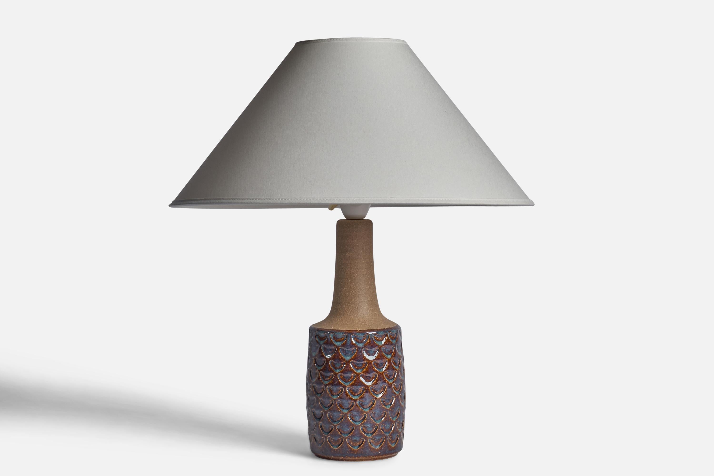 A brown and blue-glazed stoneware table lamp designed and produced in Sweden, 1960s.

Dimensions of Lamp (inches): 13.25”H x 4