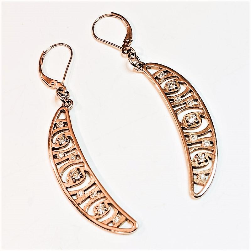 Celestial moon shaped earrings made in 14k rose gold with diamonds dangle, sway and sparkle. The lunar shape is a 2” dangle from the earring itself. Total length of the earring is 2.34