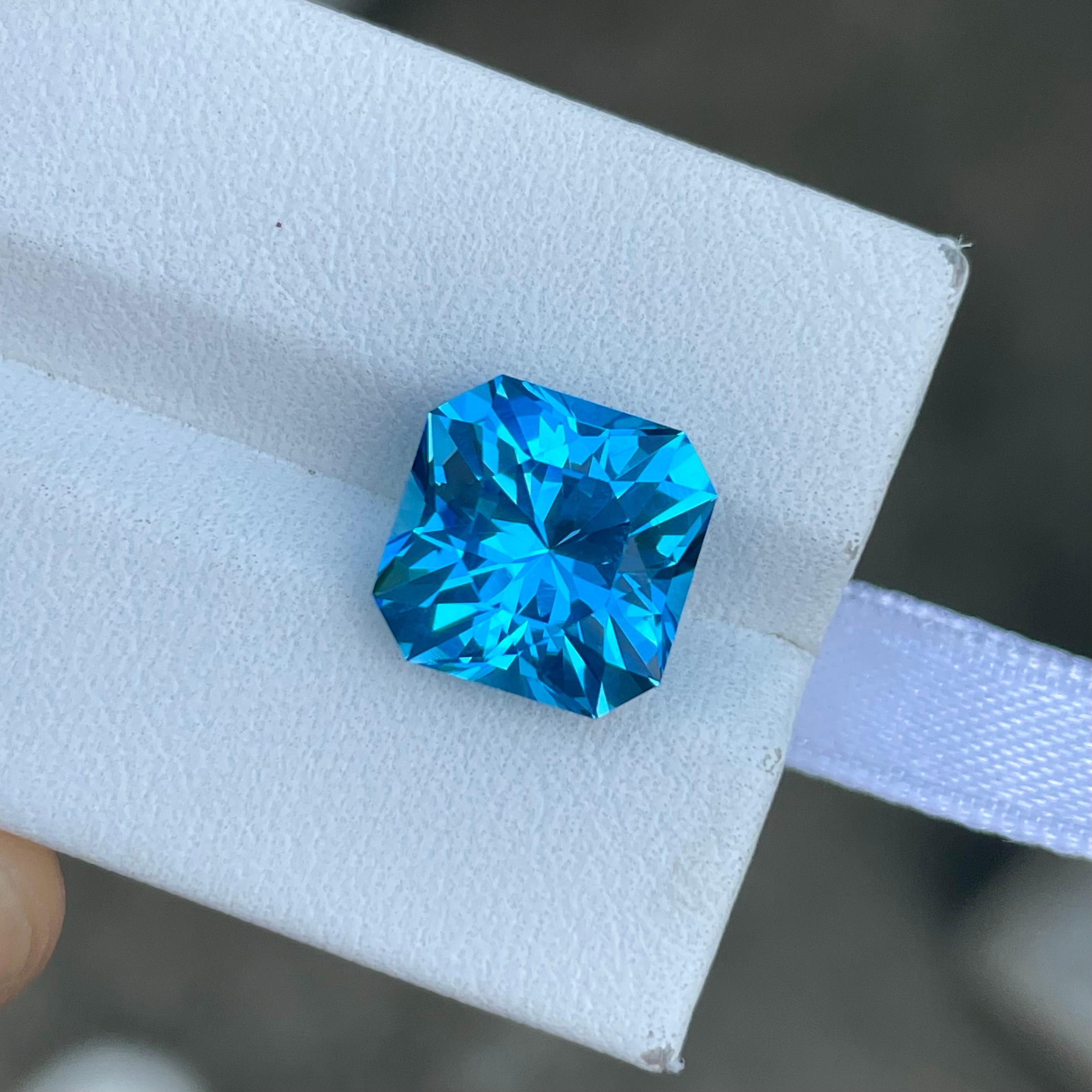 Weight 6.85 carats 
Dimensions 10.7 x 10.6 x 7.7 mm
Treatment Heated 
Origin Madagascar 
Clarity Loupe Clean 
Shape Octagon 
Cut Custom Precision



Elevate your jewelry collection with the exquisite charm of our Neon Blue Topaz. This dazzling