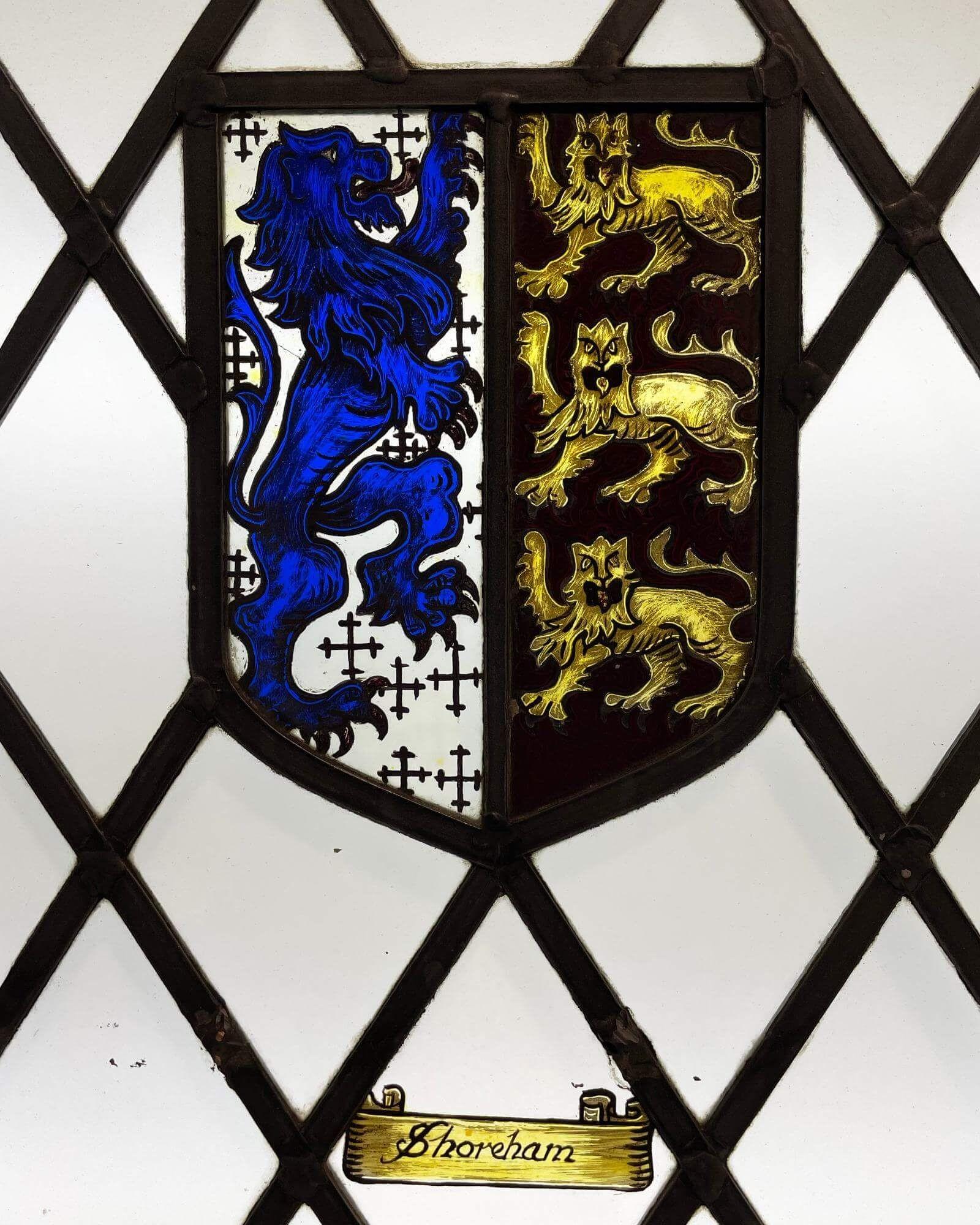 An early 20th century antique English stained glass window detailed with the Shoreham-by-Sea Coat of Arms. This stained glass window is one of a series of panels we are selling from towns and cities on the south coast of the British Isles.

The