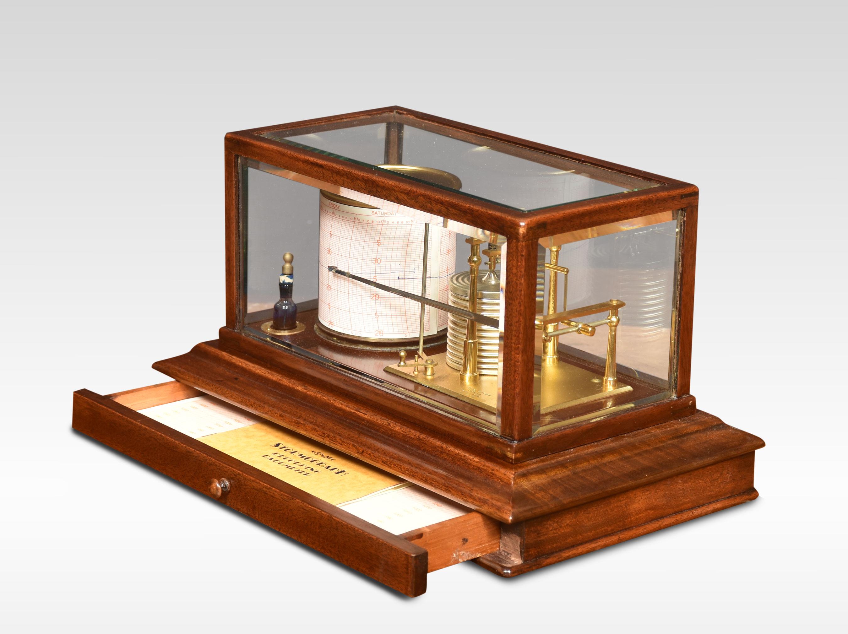 Short and Mason walnut-cased Barograph, having five bevelled glazed removable lid, and a drawer below to house the charts. The mechanical eight-day movement is housed in the drum, fitted with a seven-day chart that covers one full rotation of the