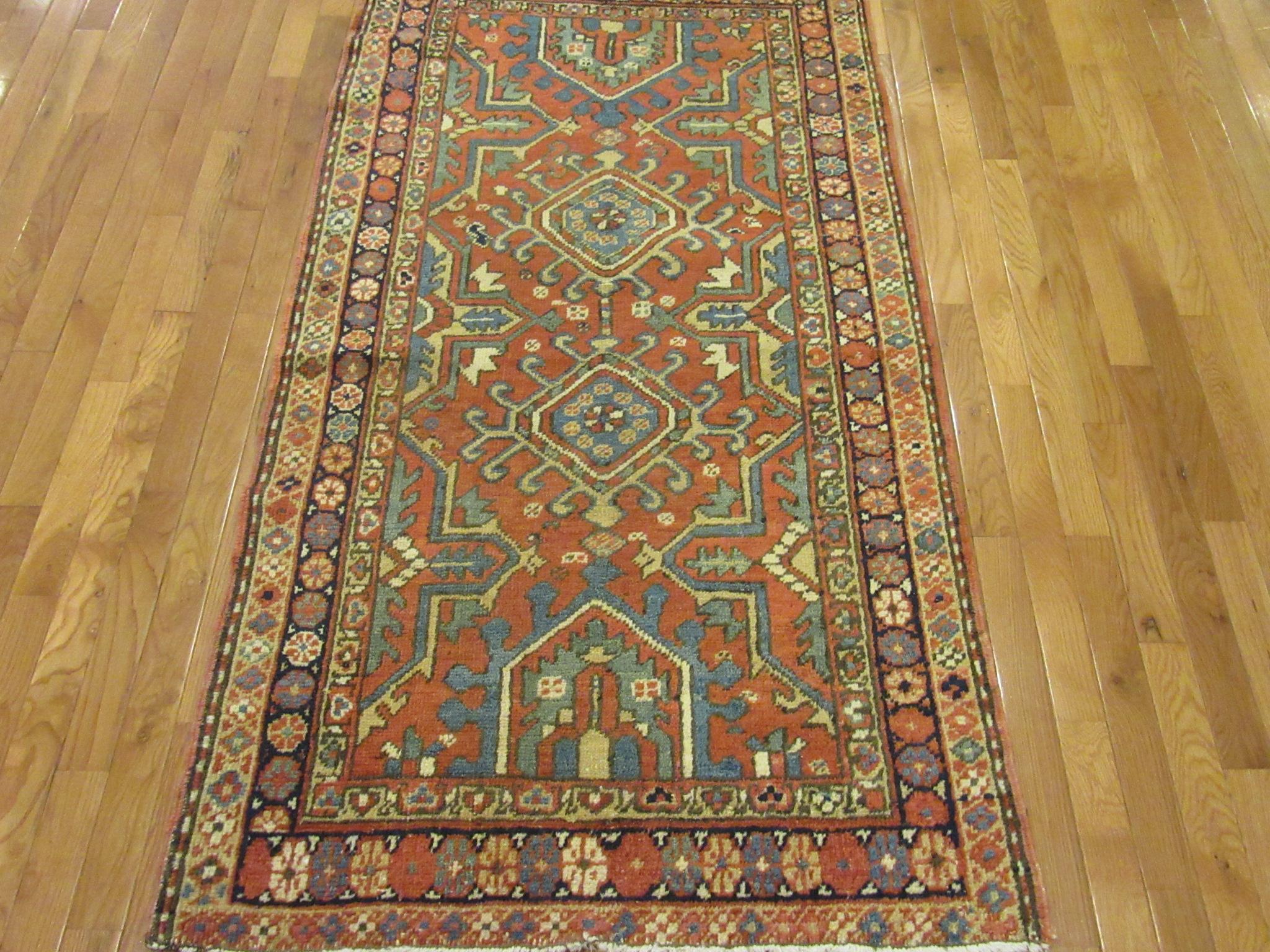 This is a small hand-knotted antique Persian Heriz rug. It is made with wool pile and cotton foundation and natural dyes in an all-over geometric design. It a perfect rug for any spot in your house or office. The rug measures
3' x 5' 6'' and in