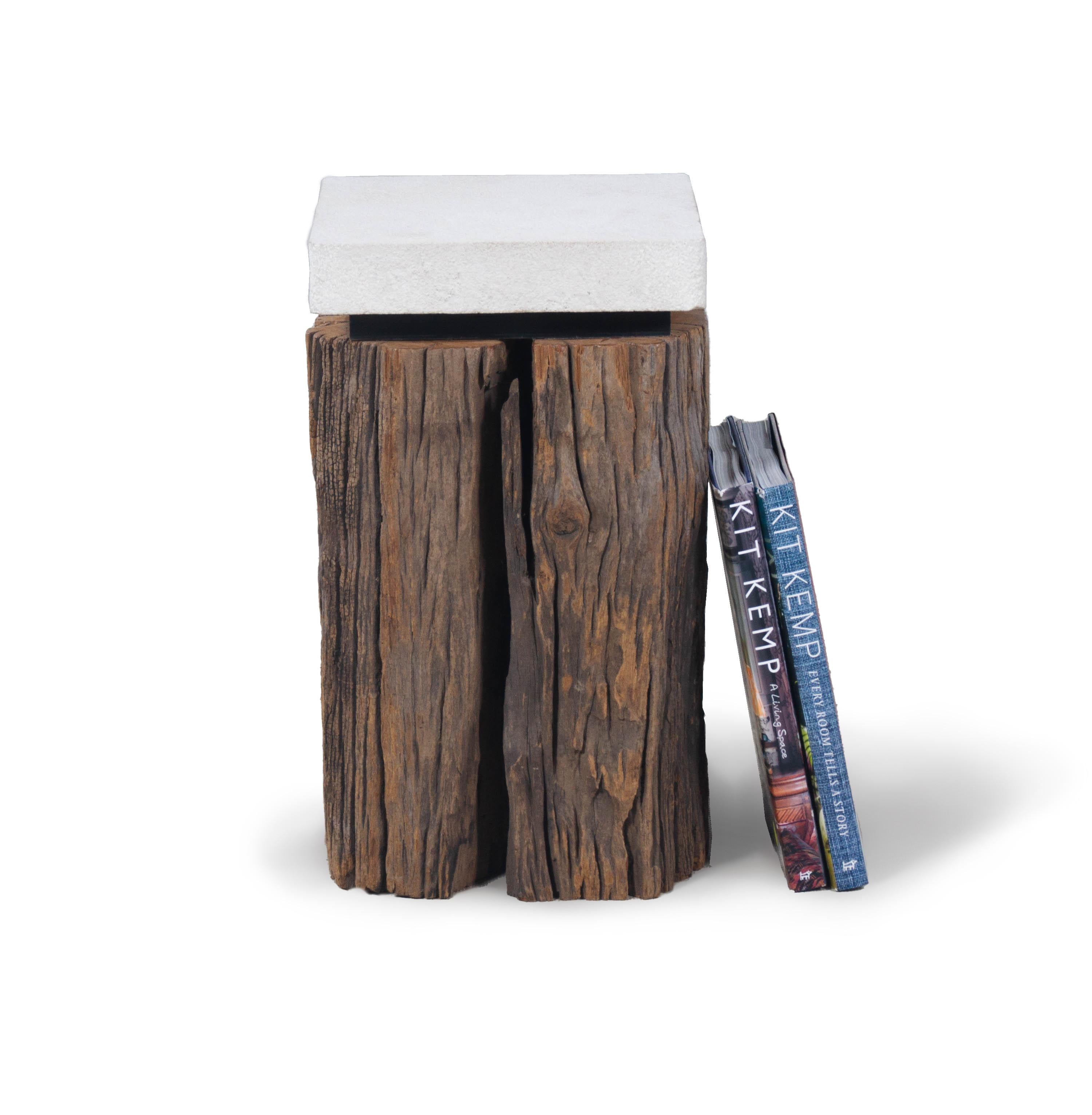 This end tables is made from a mildly weathered canal posts that features beautiful fissures that add organic texture and interest to any room. The wood features a rich walnut tone that marries perfectly with warm and cool color palettes. This