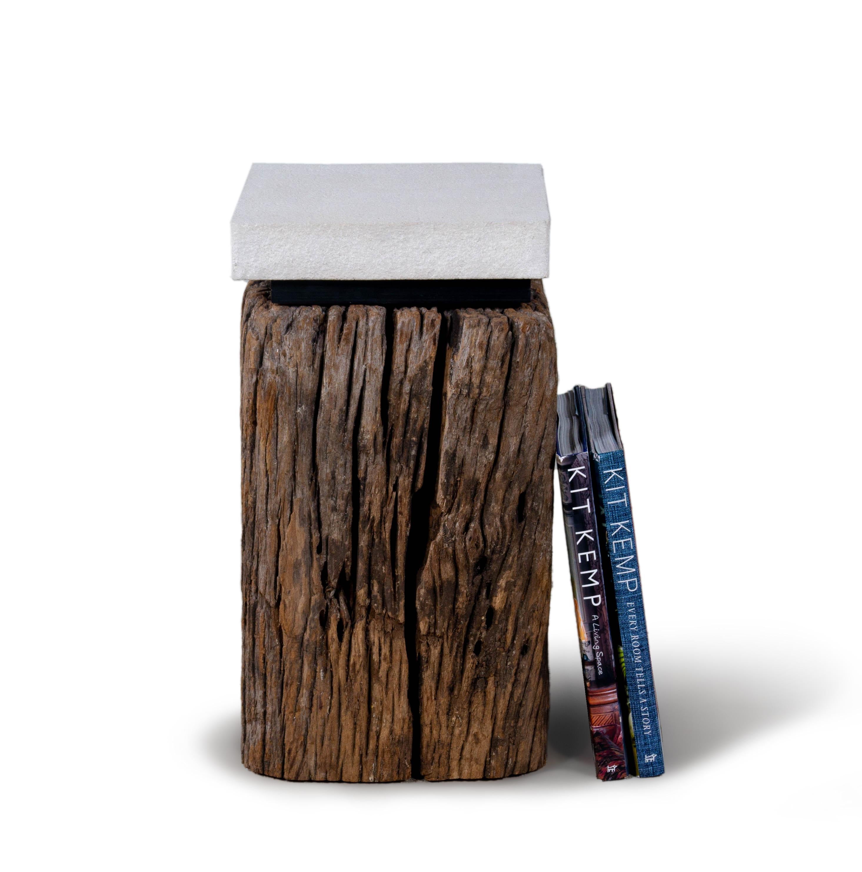 This end tables is made from a mildly weathered canal posts that features beautiful fissures that add organic texture and interest to any room. The wood features a rich walnut tone that marries perfectly with warm and cool color palettes. This