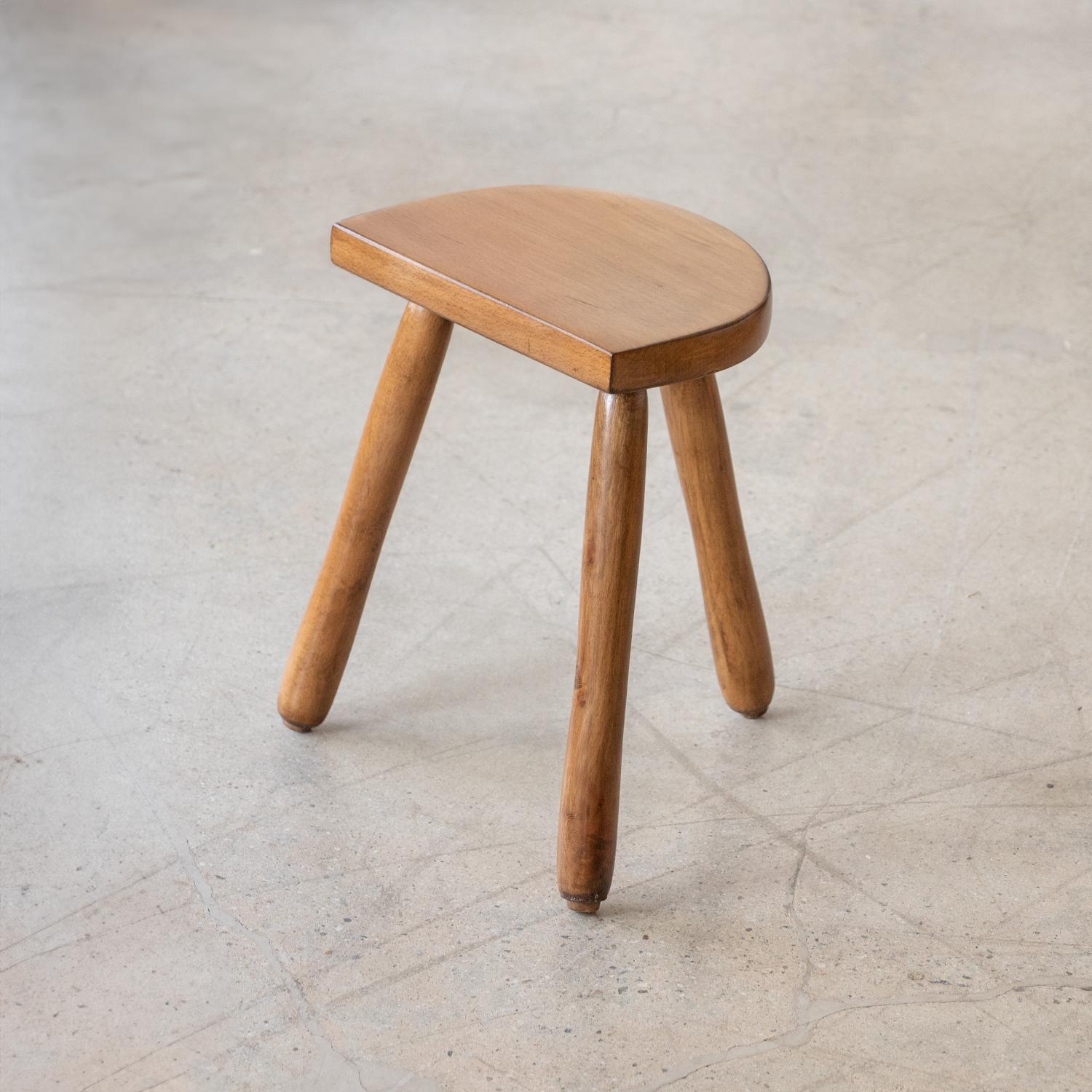 Vintage short wood stool with semi-circle seat and smooth wood legs from France. Newly refinished. Can be used as stool or as side table next to chairs. 



