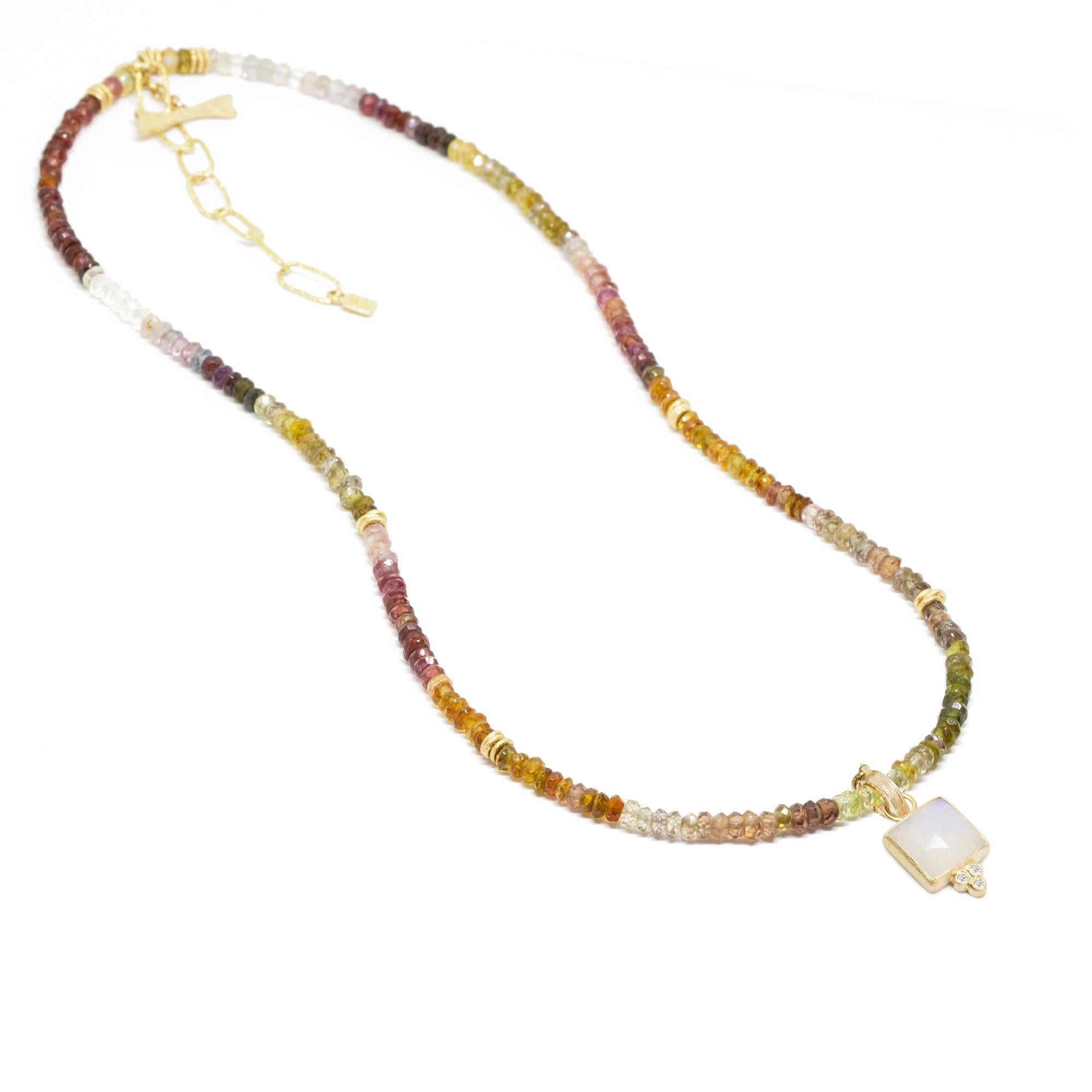 The best part about the Short Heritage Gold Necklette isn’t just that it can be worn long, doubled-up, or as a wrap bracelet (although that’s pretty cool). It’s that you can thread any of our Charms onto the natural zircon beads—have fun playing