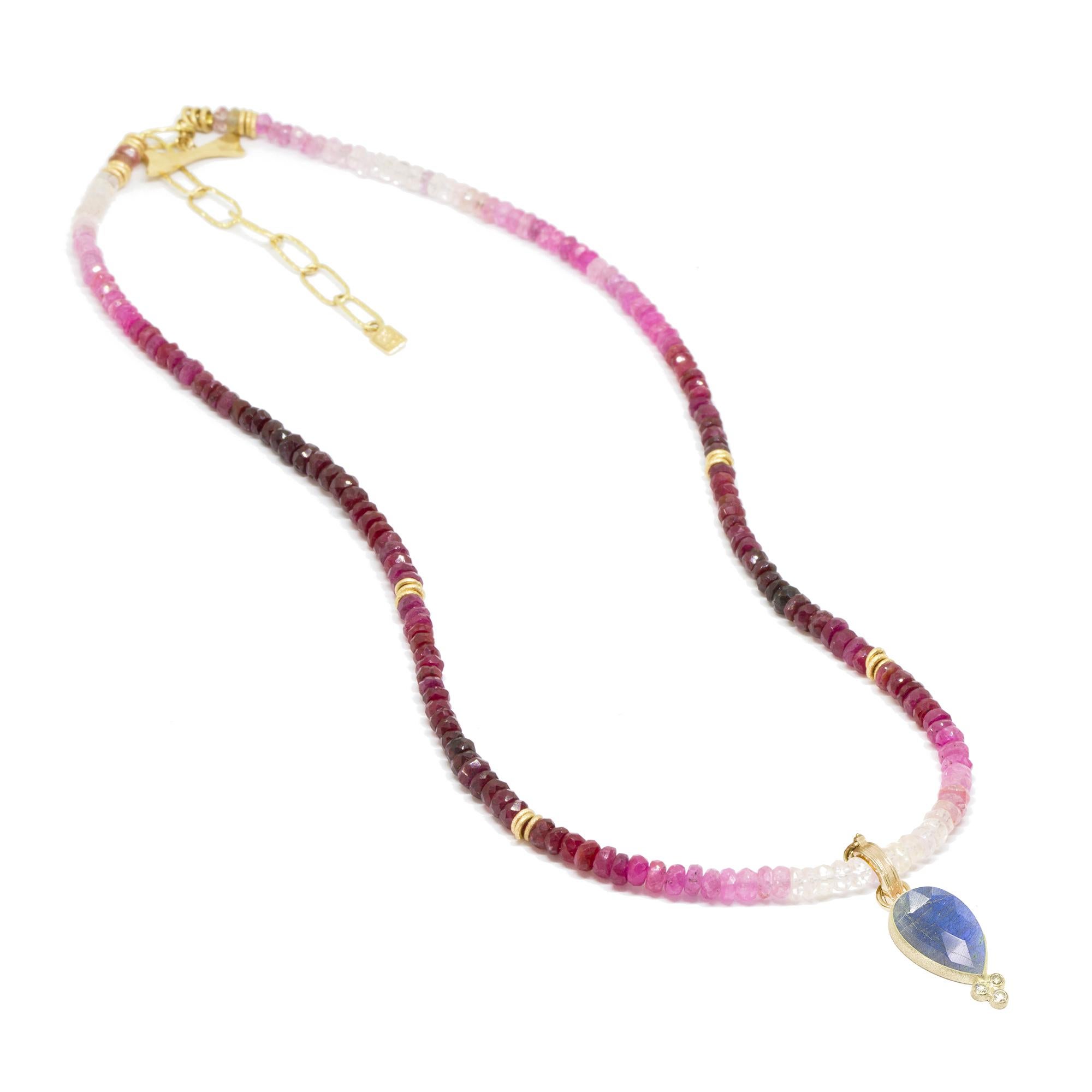 The best part about the Short Heritage Gold Necklette isn’t just that it can be worn long, doubled-up, or as a wrap bracelet (although that’s pretty cool). It’s that you can thread any of our Charms onto the ruby beads—have fun playing with all the